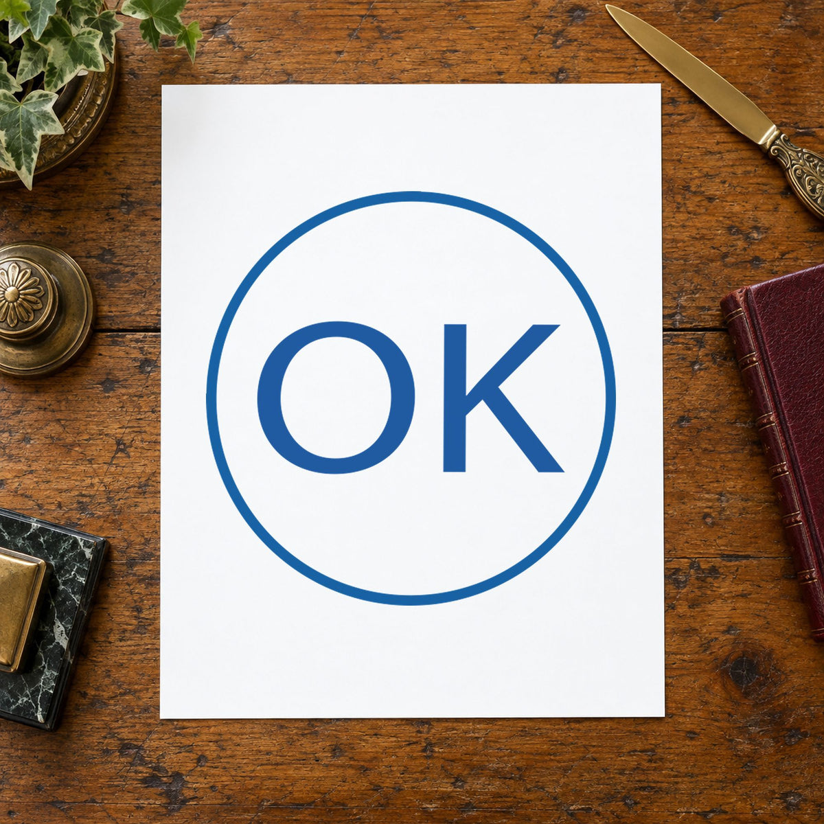 "OK" Xstamper stamp at work on everyday office paperwork