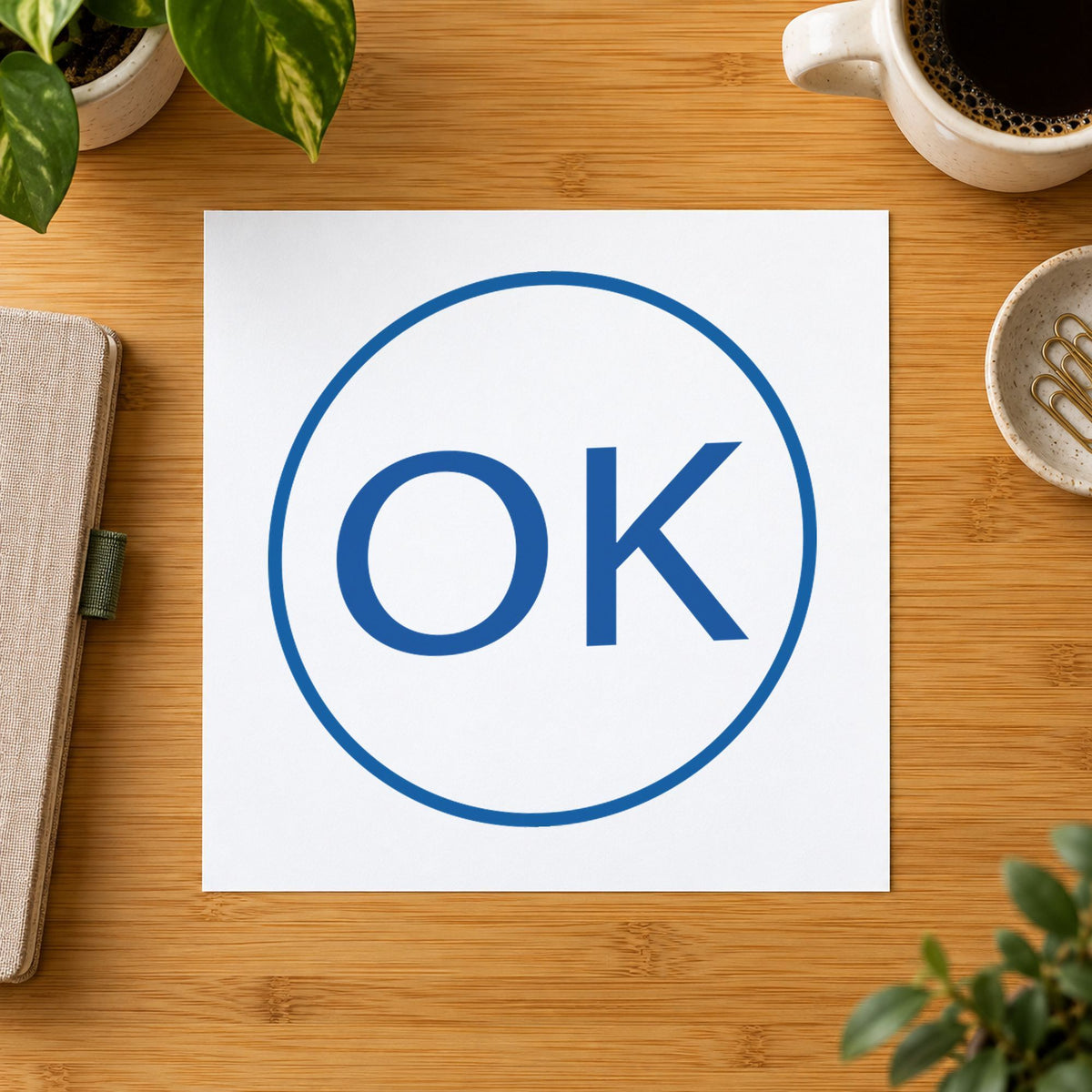 "OK" stamp pressed on paper, no separate ink pad needed