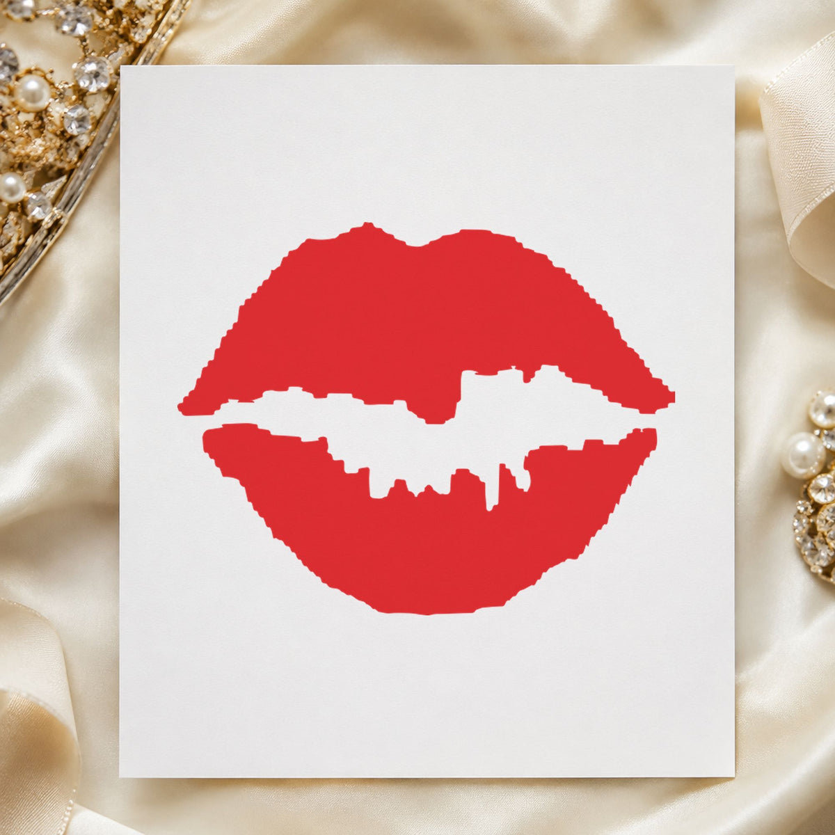 "Kiss" Xstamper stamp in use on paper, Approximately 5/8 in diameter round imprint
