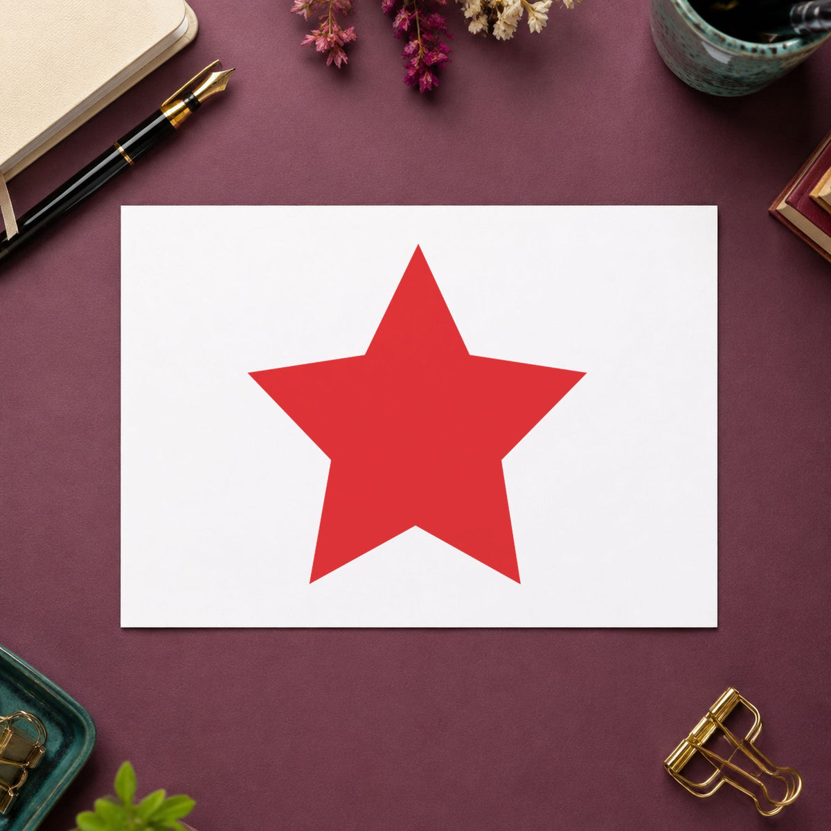 "Star" Xstamper pre-inked stamp beside its round imprint