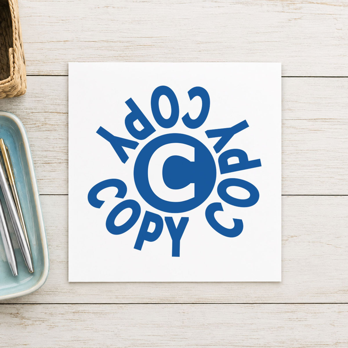 Pre-inked "Copy" stamp marking paperwork in an office setting