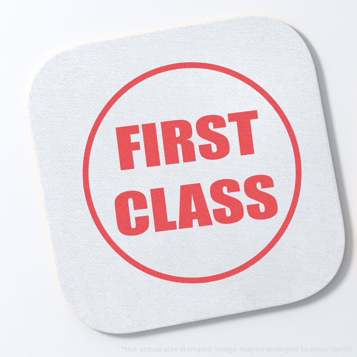 "First class" stamp and its crisp Approximately 5/8 in diameter impression on paper