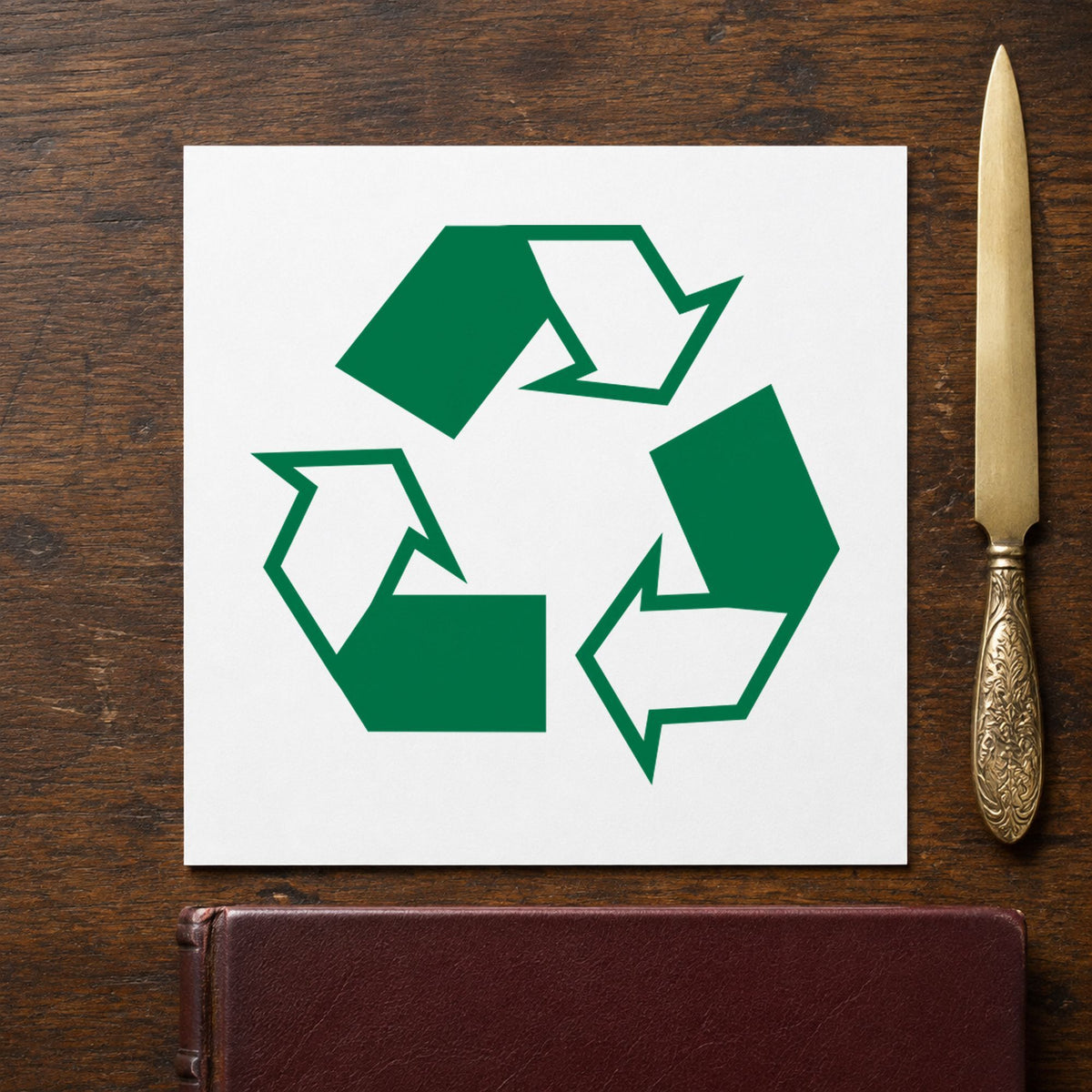 "Recycle logo" imprint sized Approximately 5/8 in diameter on a document page