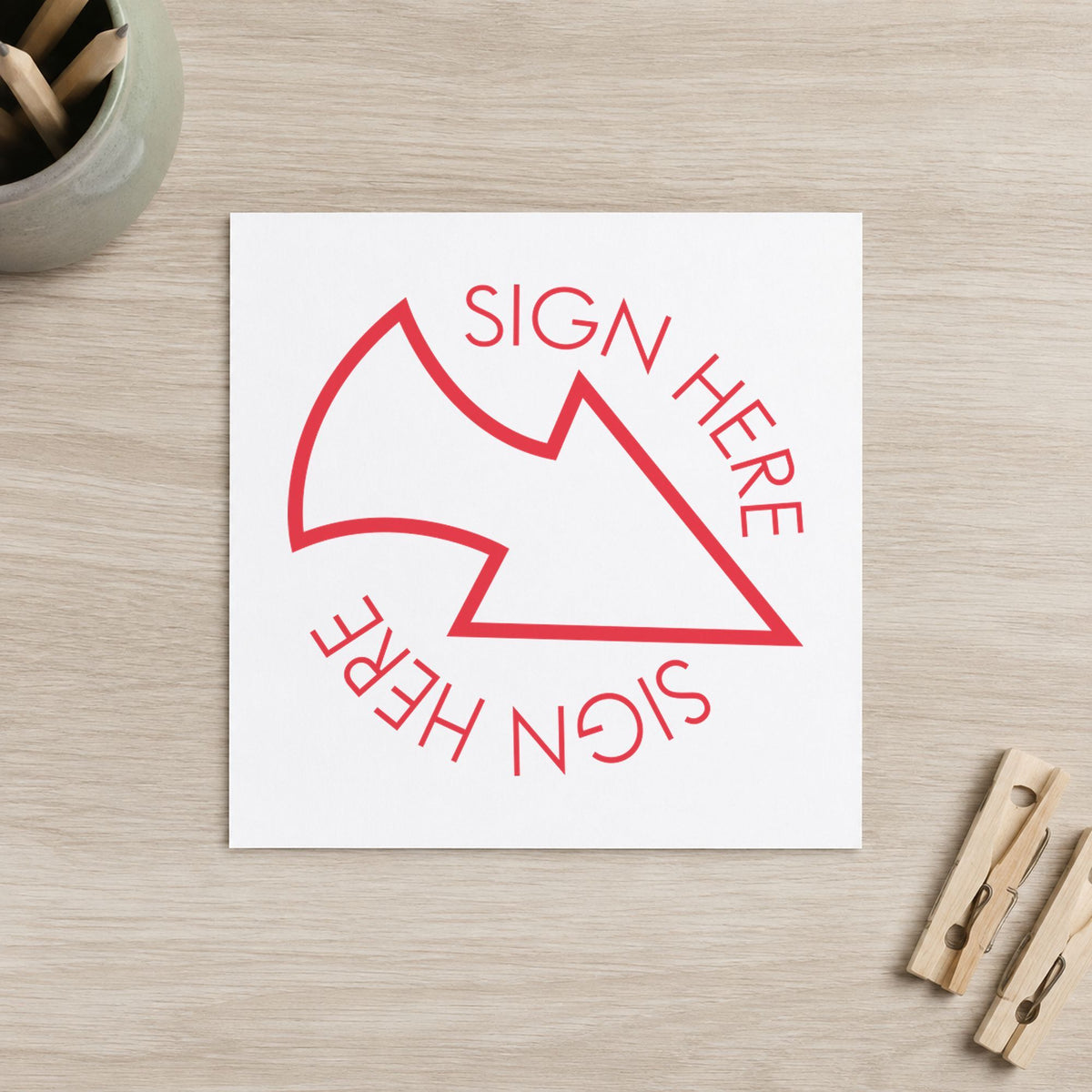 "Sign here" imprint on a printed page, Xstamper No. 11425