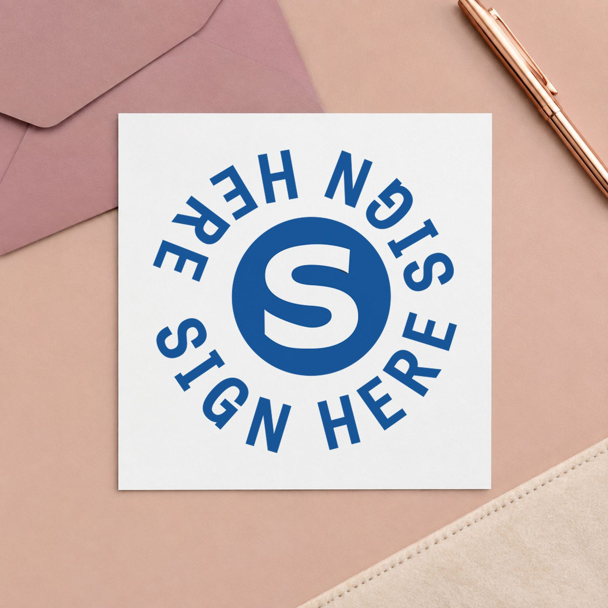 "Sign here" Xstamper stamp at work on everyday office paperwork