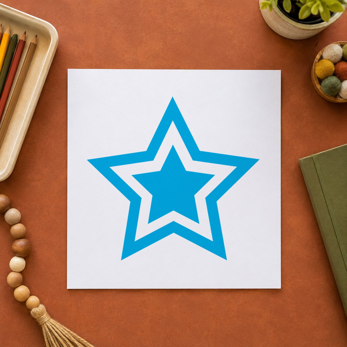 "Star" Xstamper pre-inked stamp beside its round imprint