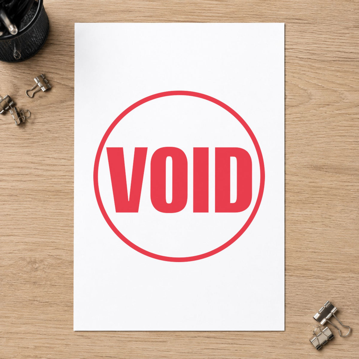 "Void" Xstamper No. 11419 stamp shown in everyday handling
