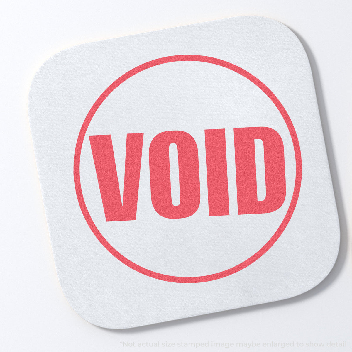 "Void" stamp and its crisp 5/8 inch impression on paper