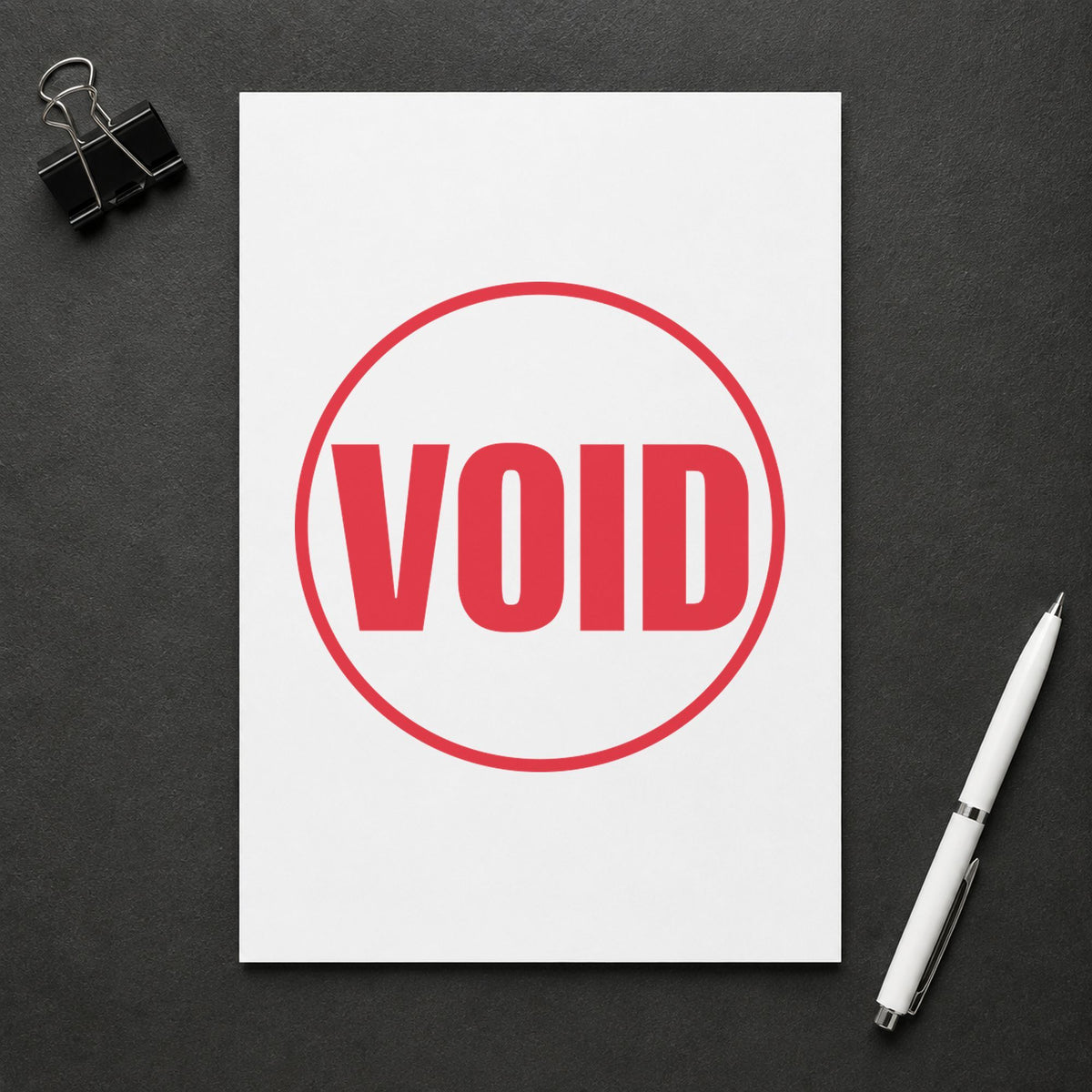 "Void" stamp pressed on paper, no separate ink pad needed