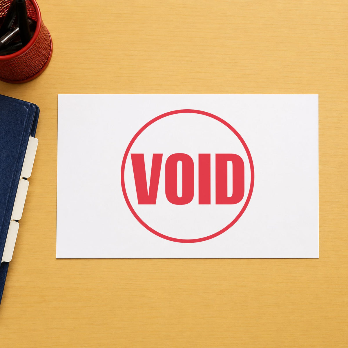 "Void" Xstamper pre-inked stamp beside its round imprint