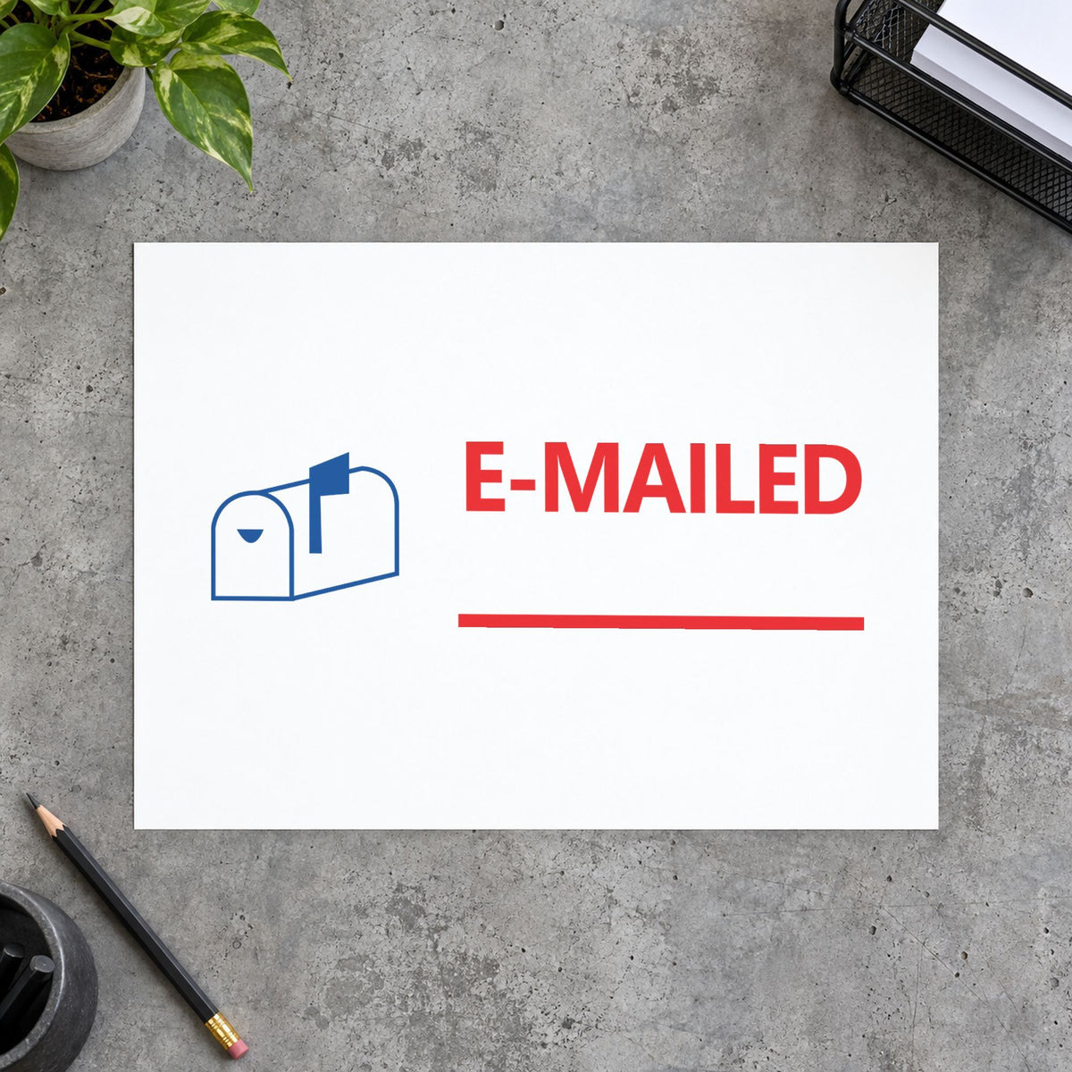 "Emailed" Xstamper stamp in use on paper, Approximately 1/2 in tall x 1-5/8 in wide rectangle imprint