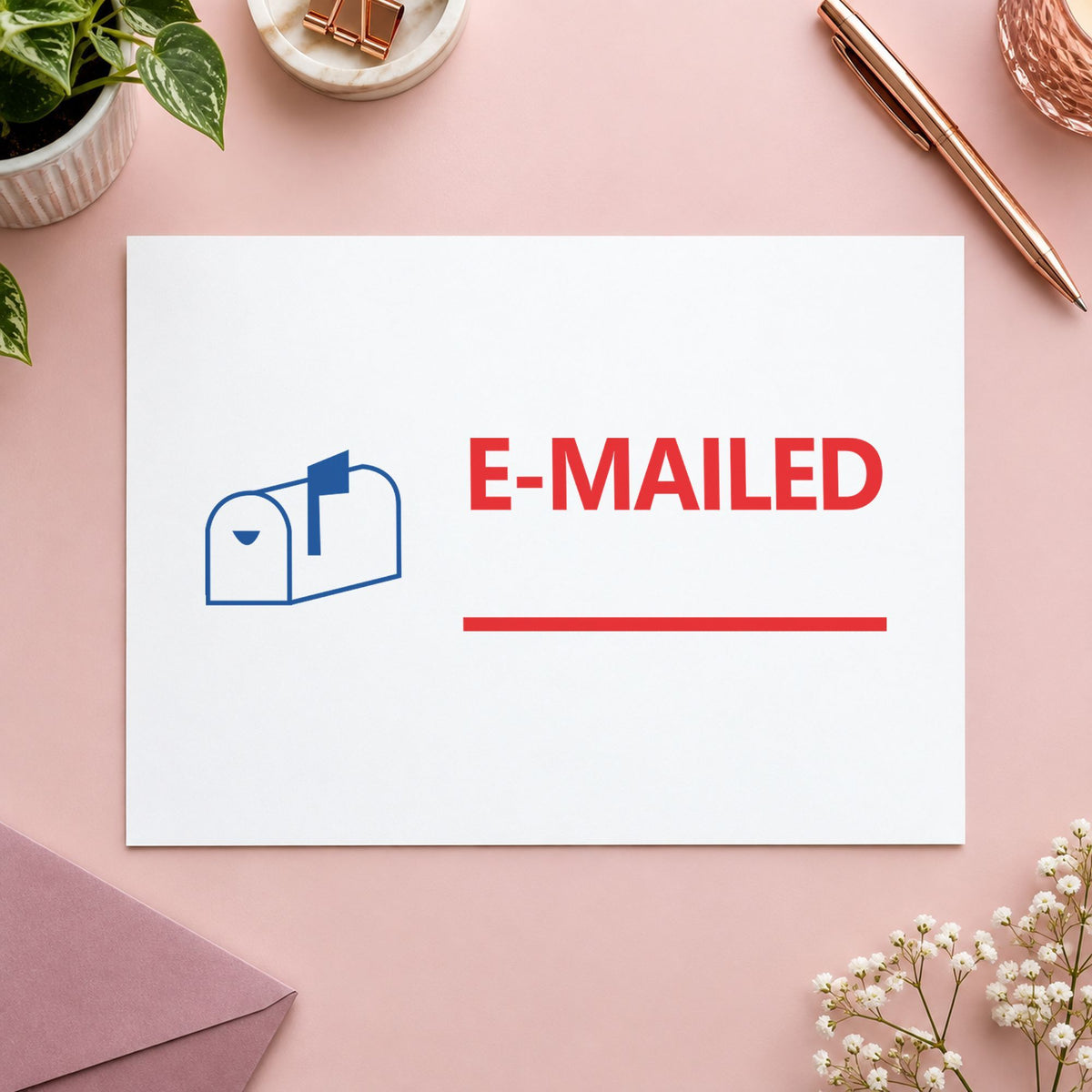 "Emailed" Xstamper No. 2025 stamp shown in everyday handling
