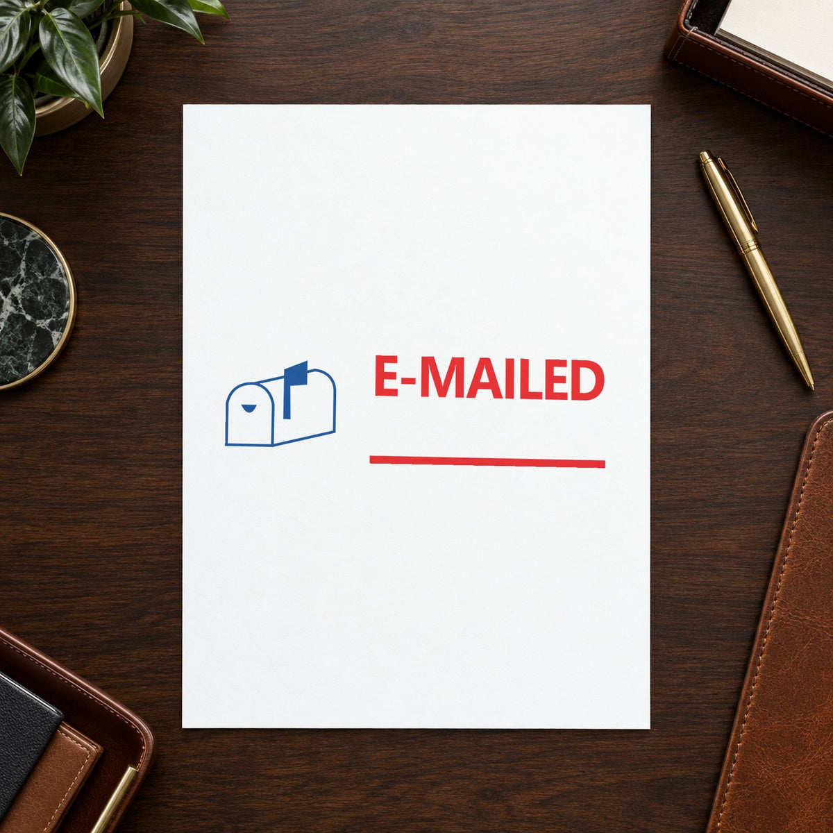 "Emailed" Xstamper pre-inked stamp beside its rectangle imprint