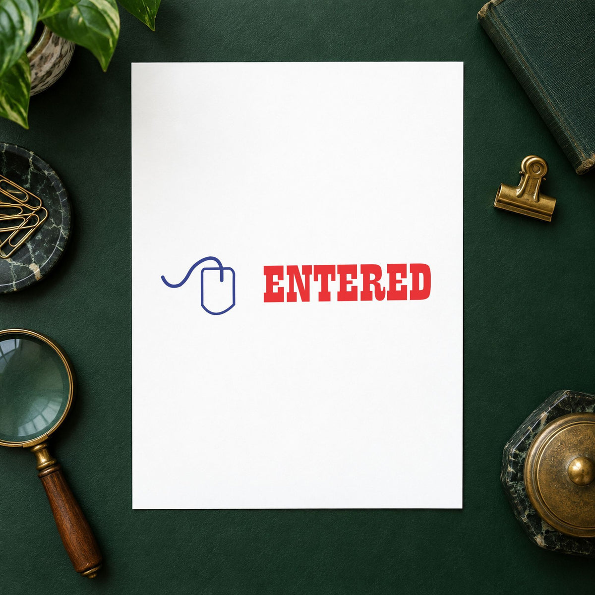 "Entered" Xstamper stamp in use on paper, 1/2 x 1-5/8 in rectangle imprint