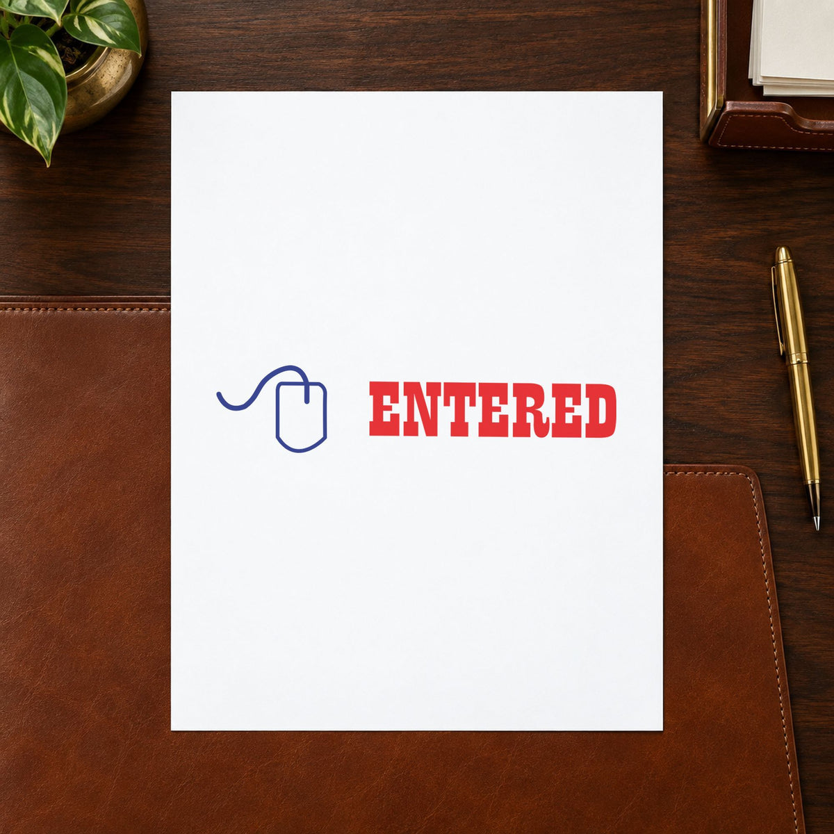 "Entered" Xstamper pre-inked stamp beside its rectangle imprint