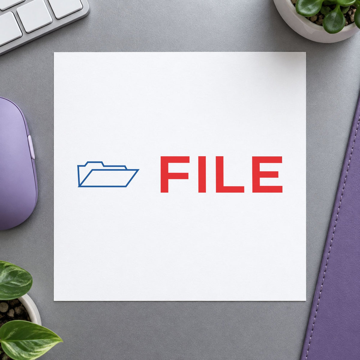 "File" Xstamper stamp at work on everyday office paperwork