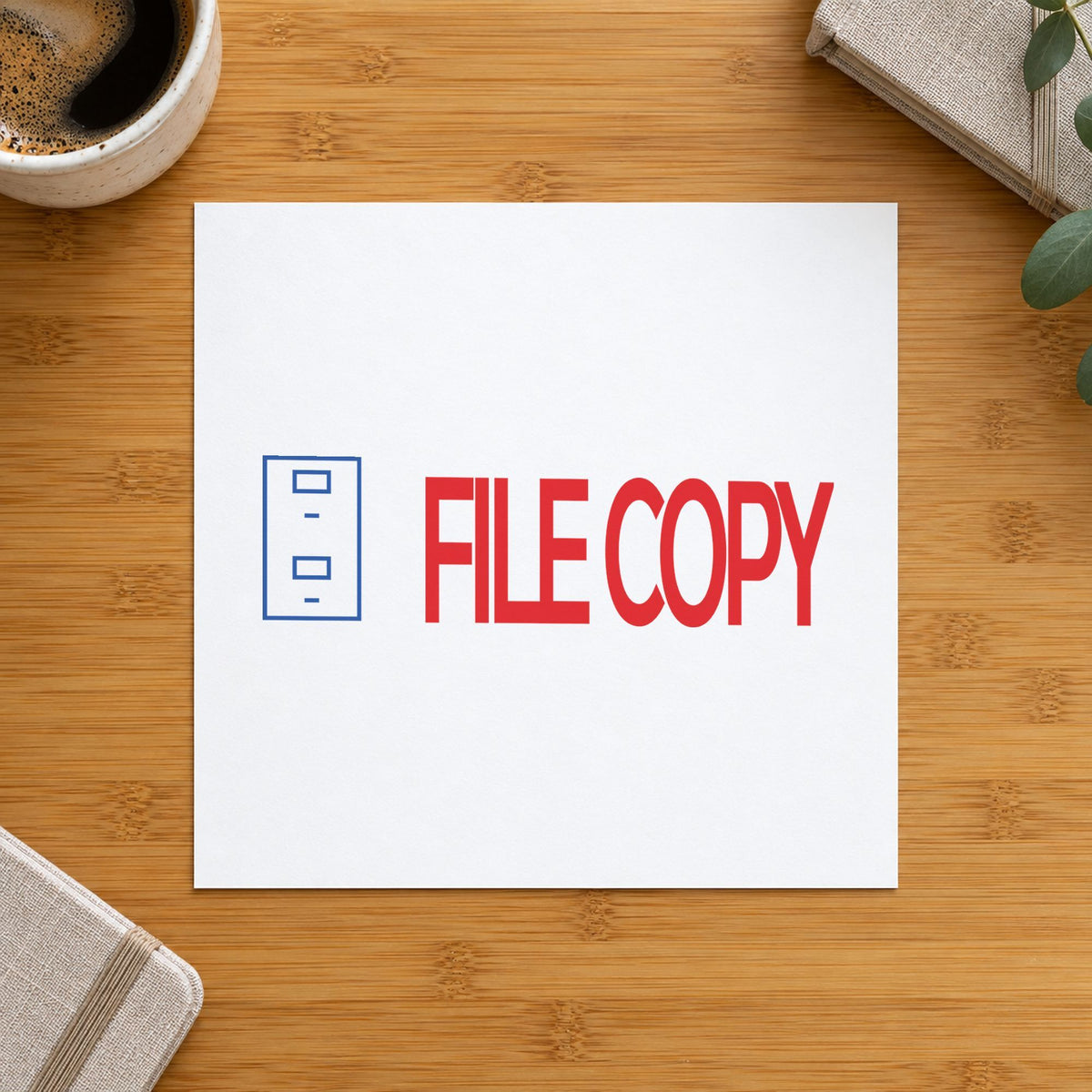 "File copy" Xstamper No. 2032 stamp shown in everyday handling