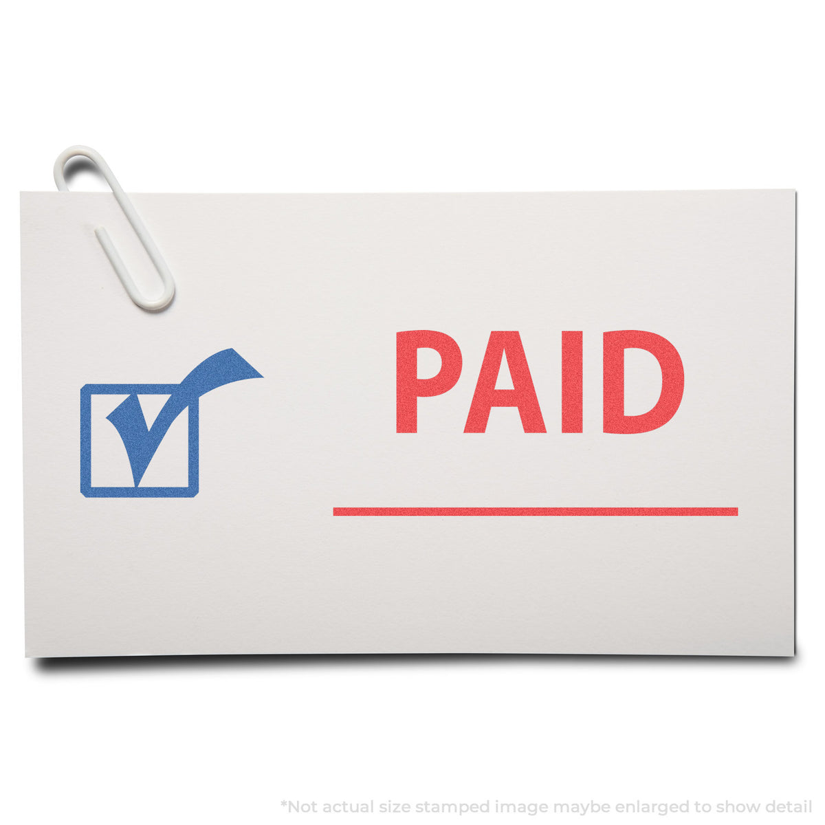 "Paid" stamp and its crisp 1/2 x 1-5/8 in impression on paper
