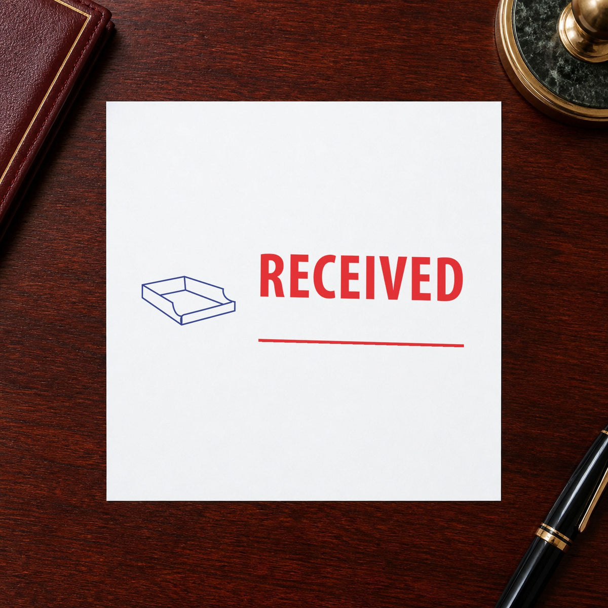 "Received" Xstamper stamp in use on paper, Approximately 1/2 in tall x 1-5/8 in wide rectangle imprint