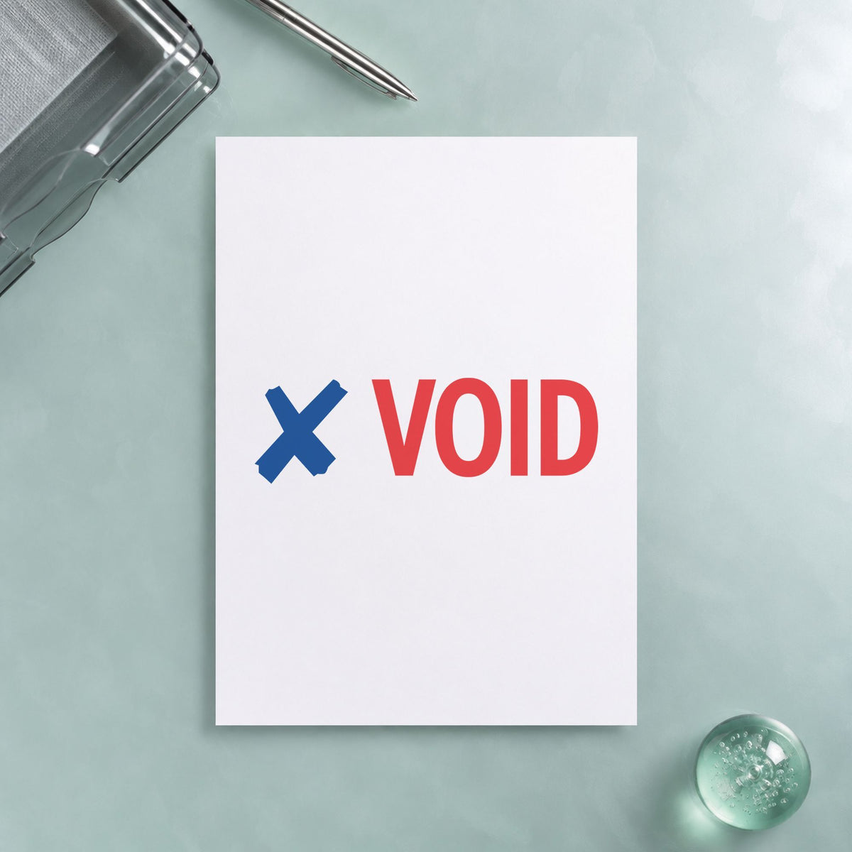 "Void" Xstamper No. 2037 stamp shown in everyday handling