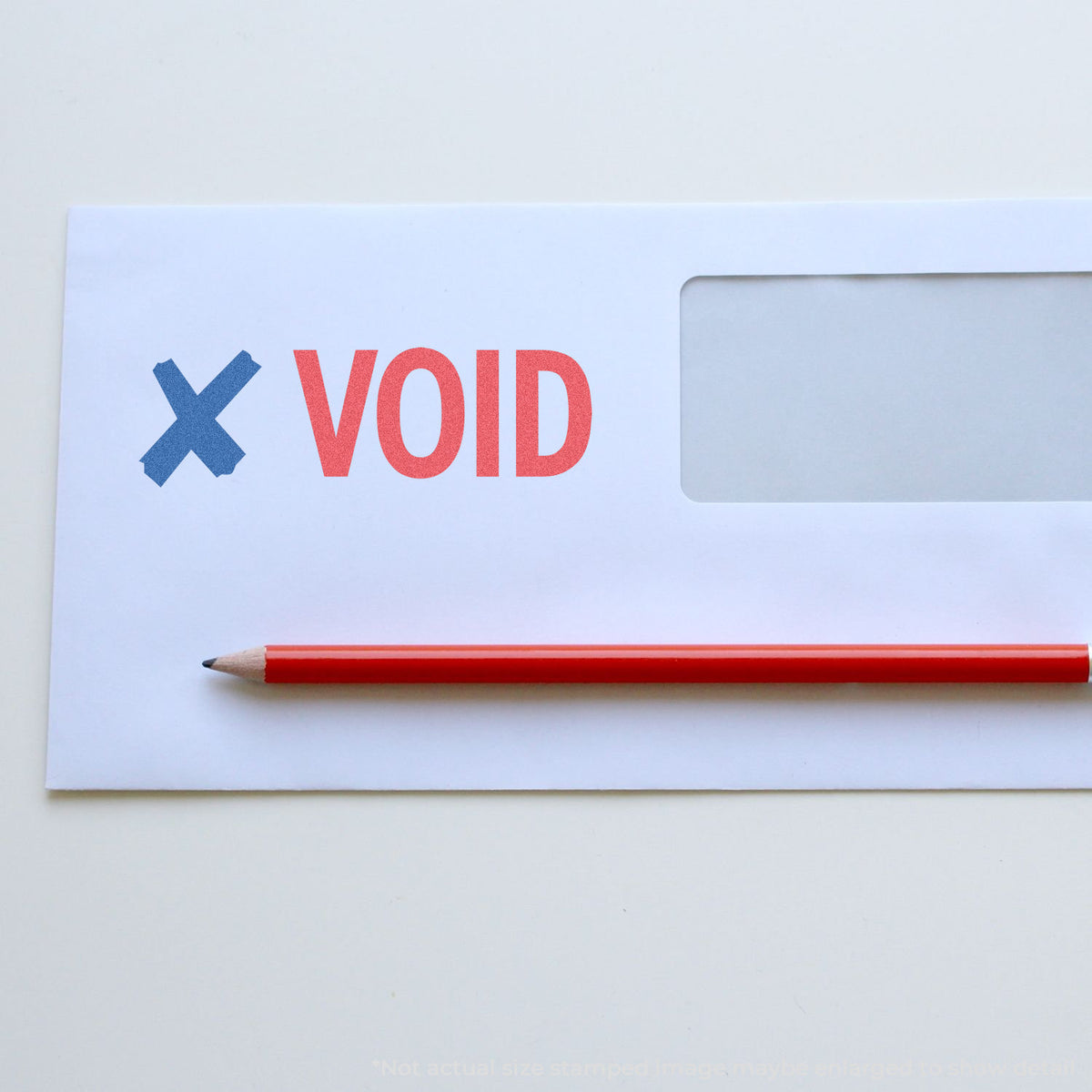 "Void" pre-inked imprint on a page, rectangle shape at 1/2 x 1-5/8 in