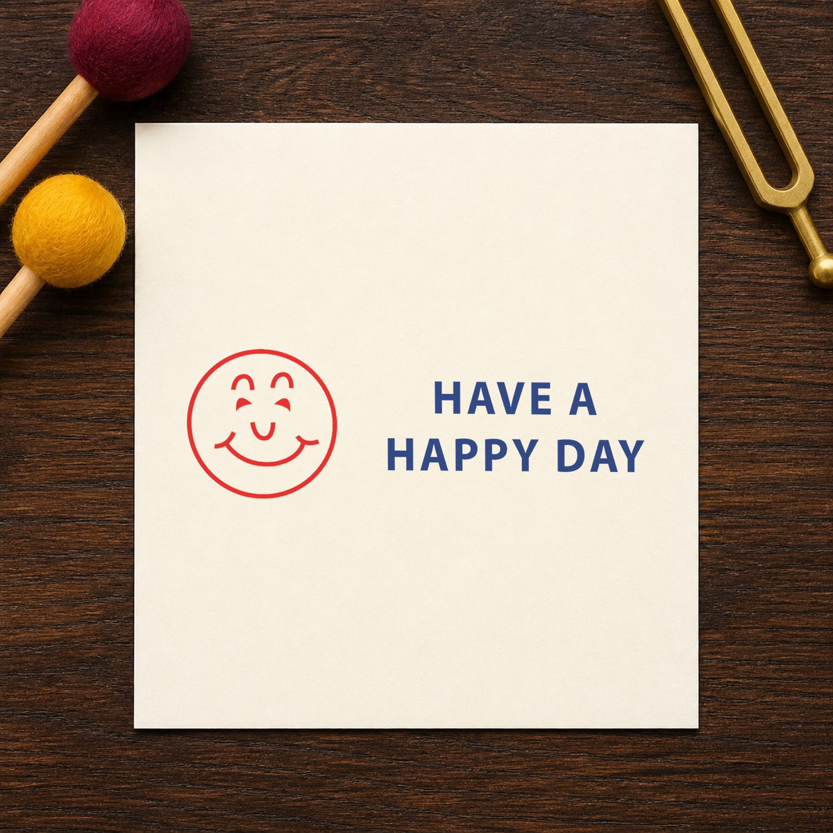 "Have a happy day" Xstamper No. 2020 stamp shown in everyday handling