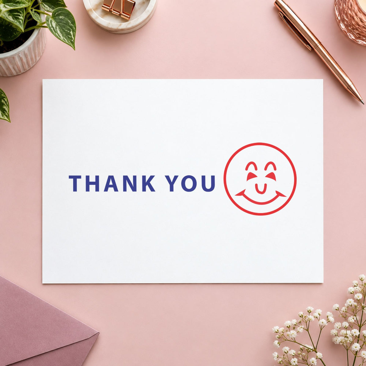 "Thank you" Xstamper No. 2018 stamp shown in everyday handling