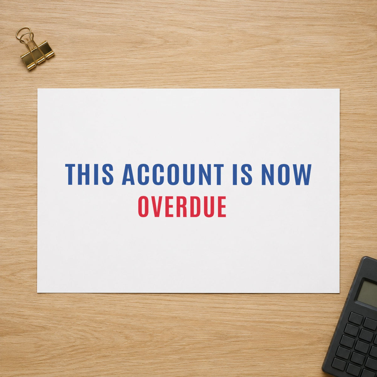 "This account is now overdue" stamp pressed on paper, no separate ink pad needed