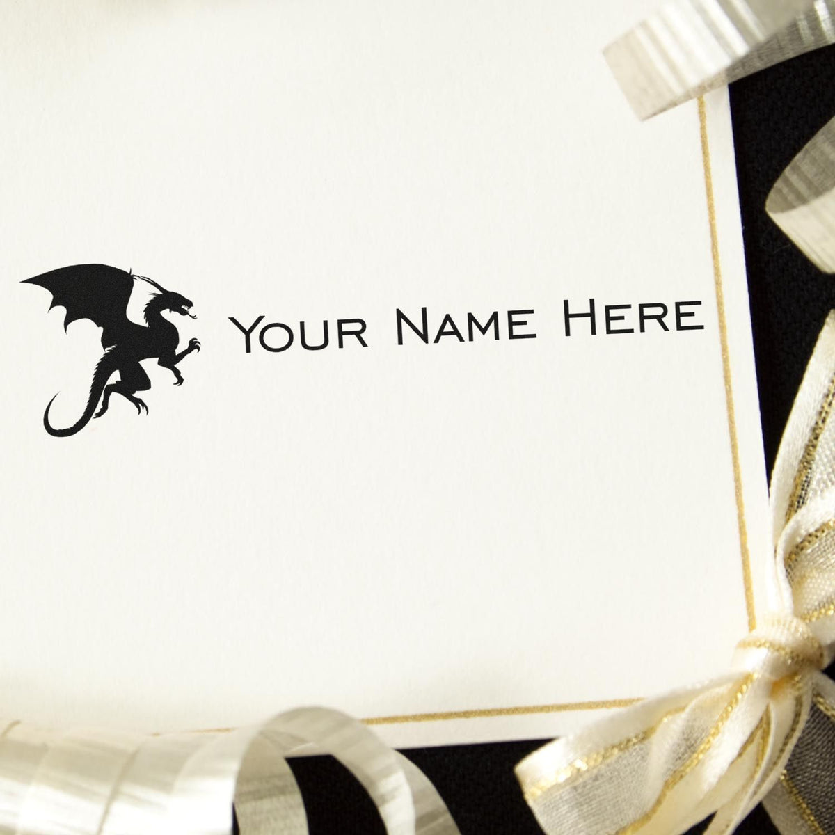 Custom stamp and seal card with black dragon logo, Your Name Here text, and gold ribbon accents on white.