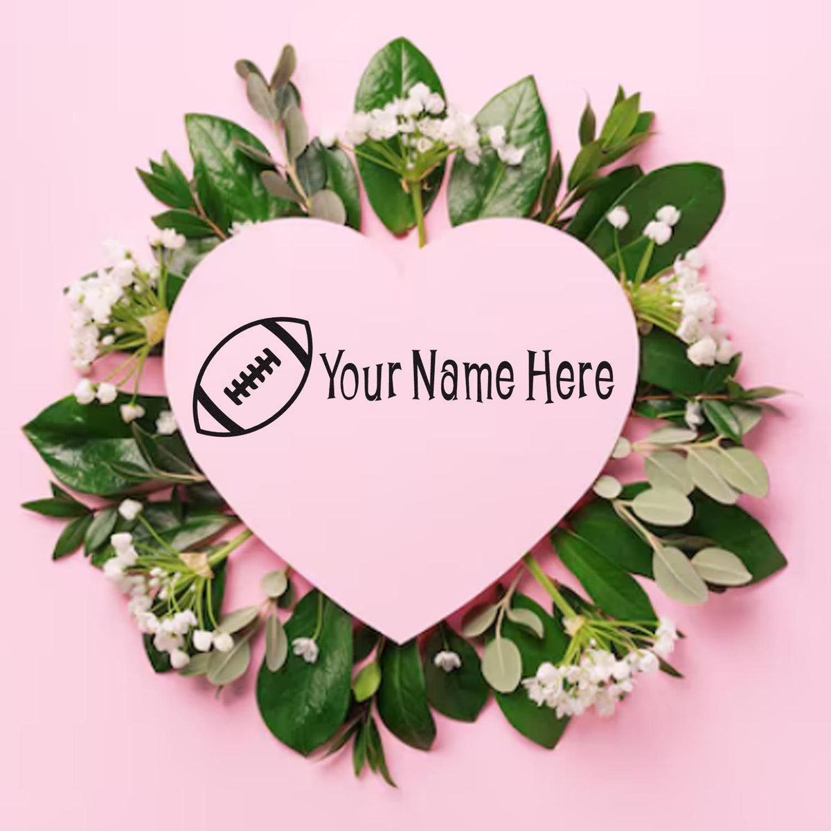 Pink heart custom stamp seal with football icon and "Your Name Here," framed by green leaves and white flowers.