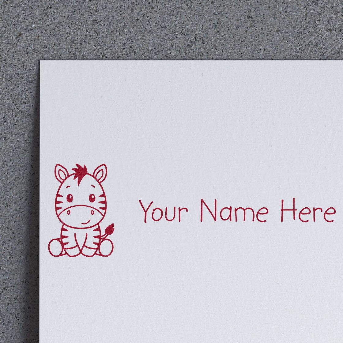 Red custom stamp seal featuring a zebra cartoon and Your Name Here on white paper