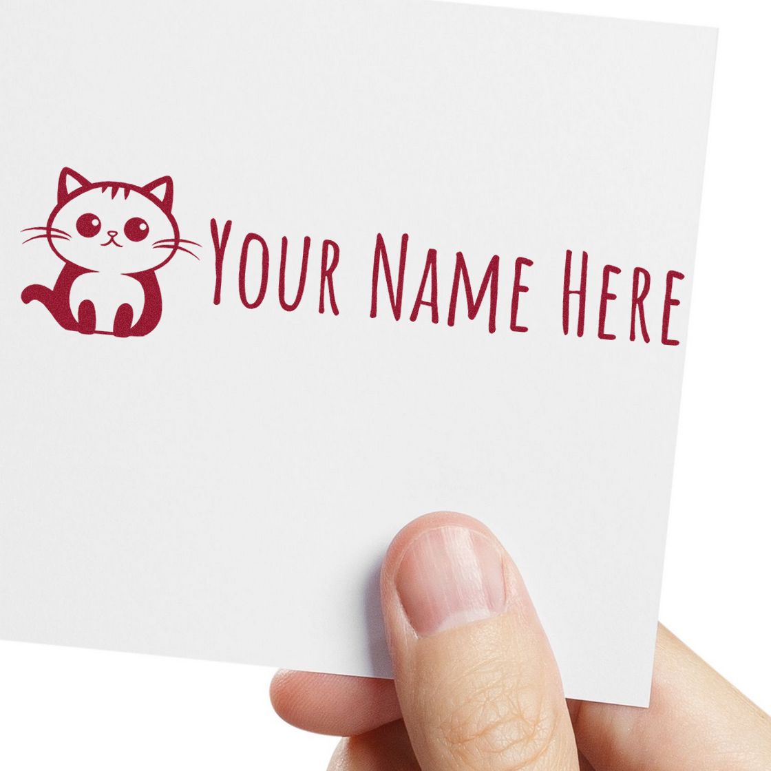 White custom stamp and seal card with red cat seal and YOUR NAME HERE text, held by hand.