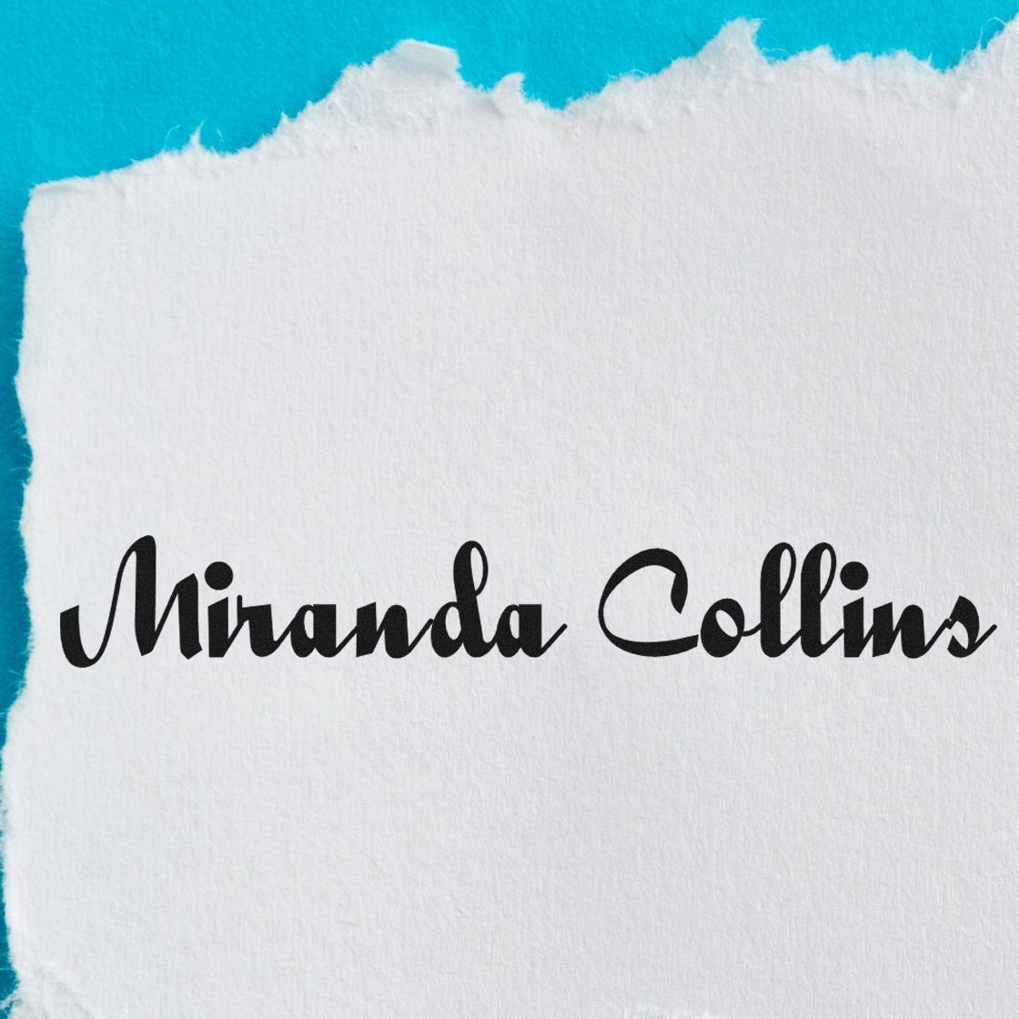 Black Miranda Collins stamp on white textured paper with turquoise background, showcasing custom stamp and seal products.