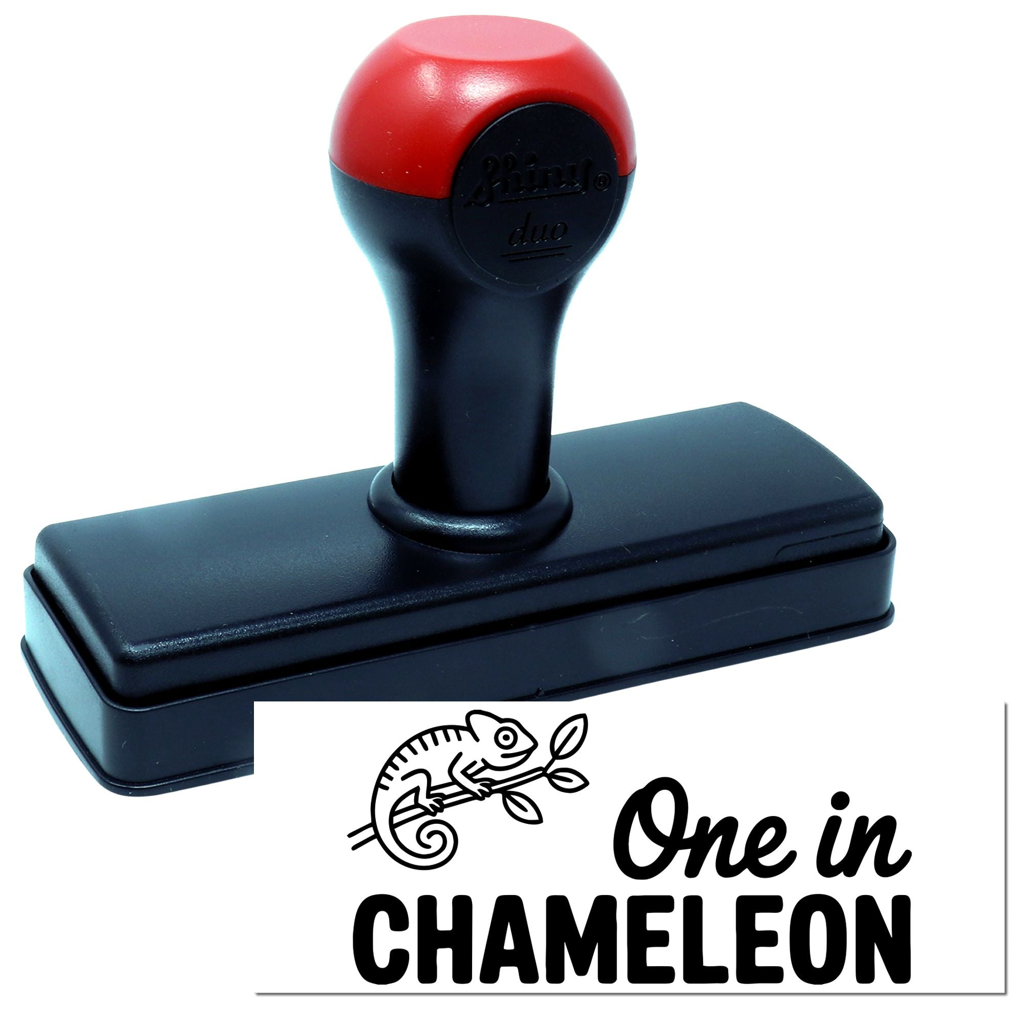 Red and black self-inking stamp with rectangular base, featuring a chameleon logo and One in CHAMELEON seal design.