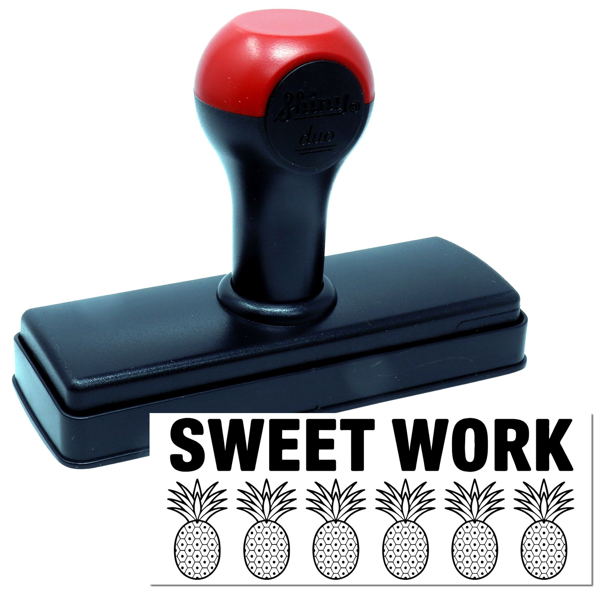 Red and black self-inking stamp with SWEET WORK text and pineapple seal design.