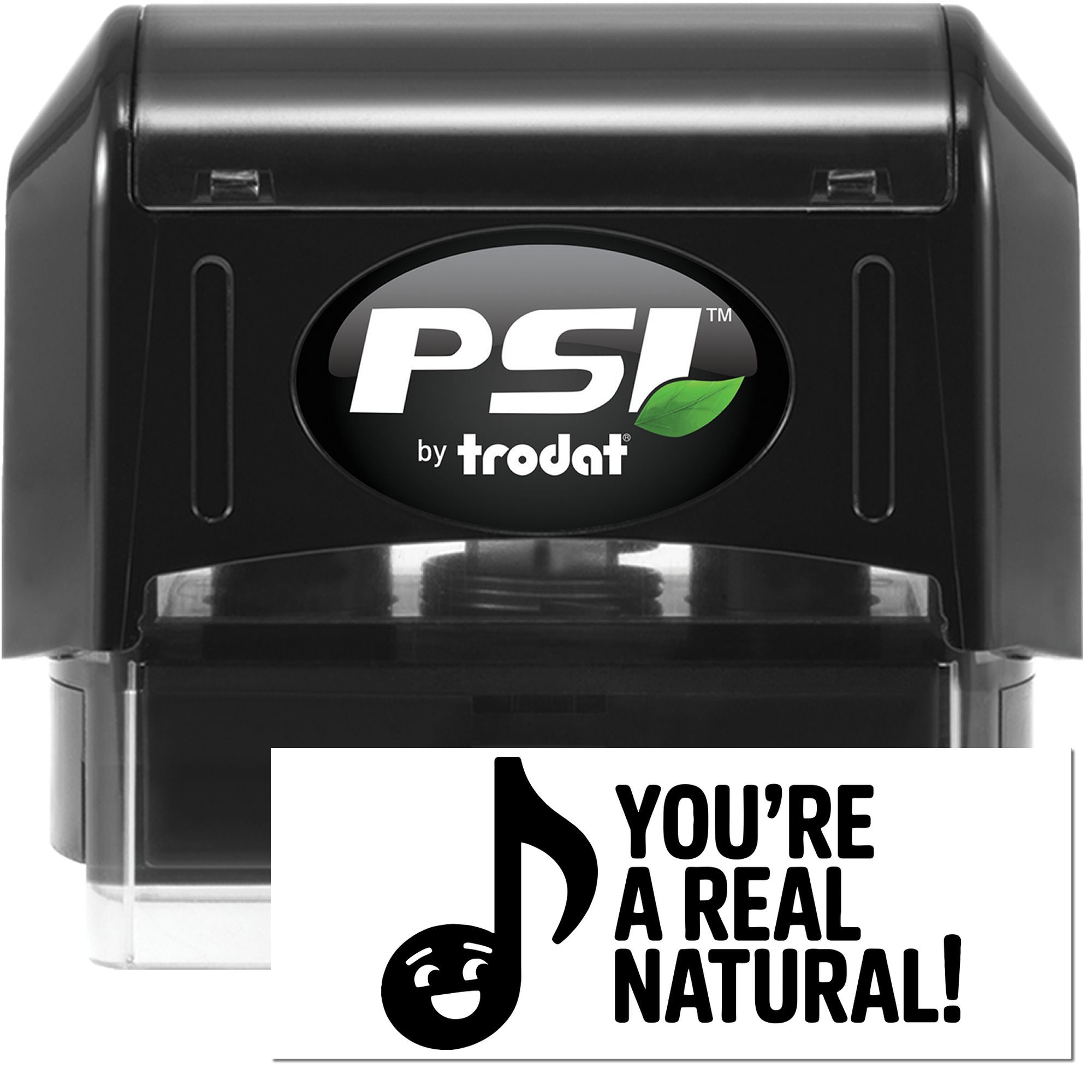Black PSI by Trodat self-inking stamp and seal with green leaf logo and white Youre a real natural! imprint.
