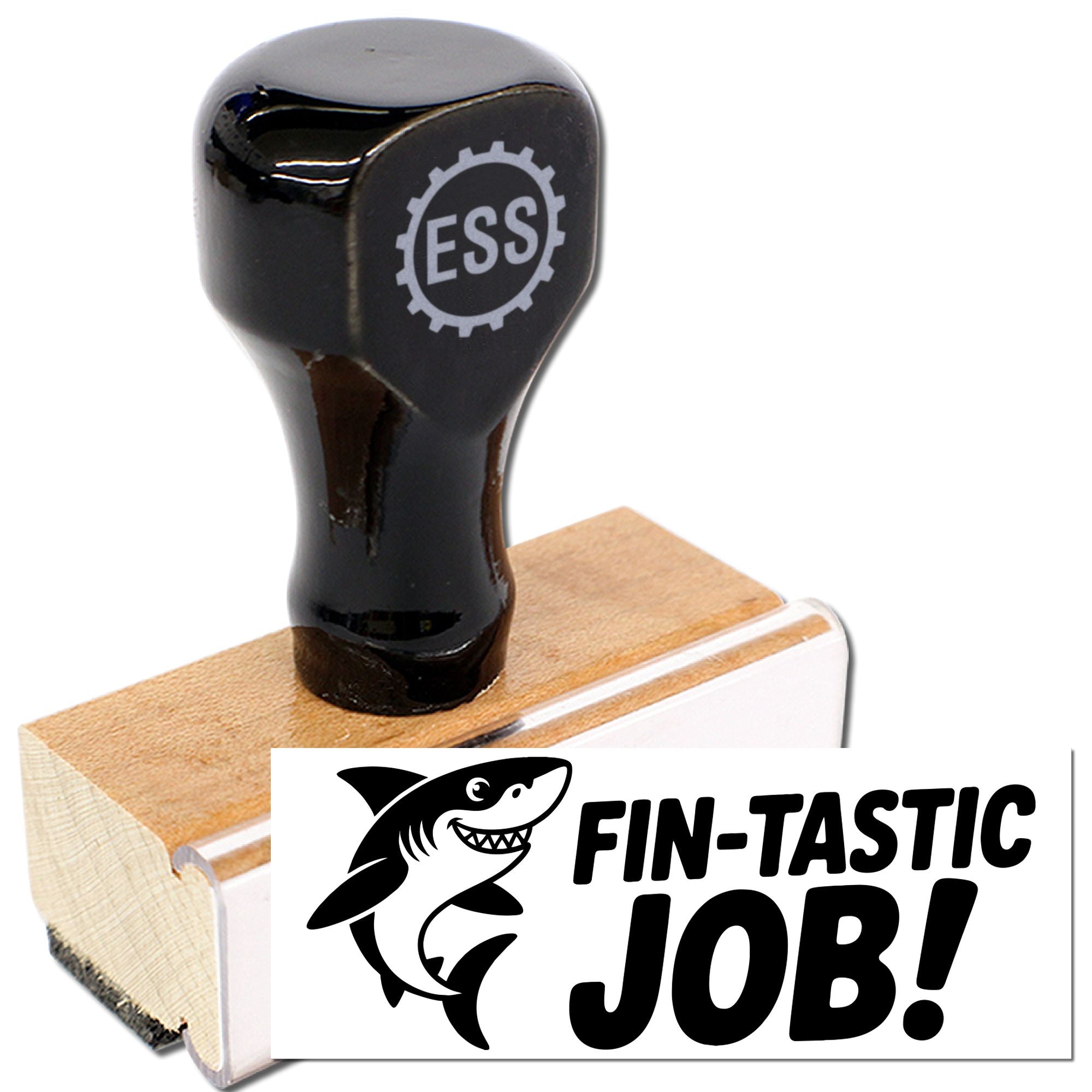 Black ESS stamp handle on wooden base with Fin-Tastic Job shark logo seal, in black and white.