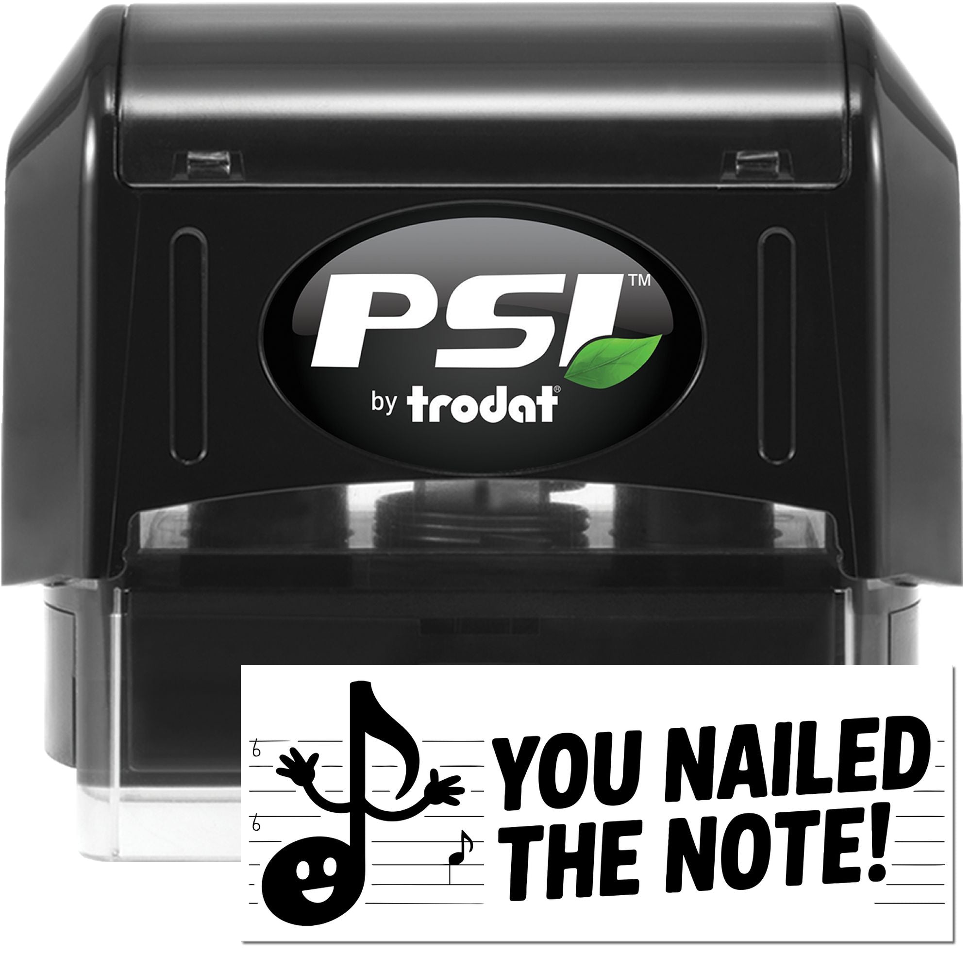 Black PSI by Trodat self-inking stamp and seal, with green leaf logo and You nailed the note! imprint on white paper