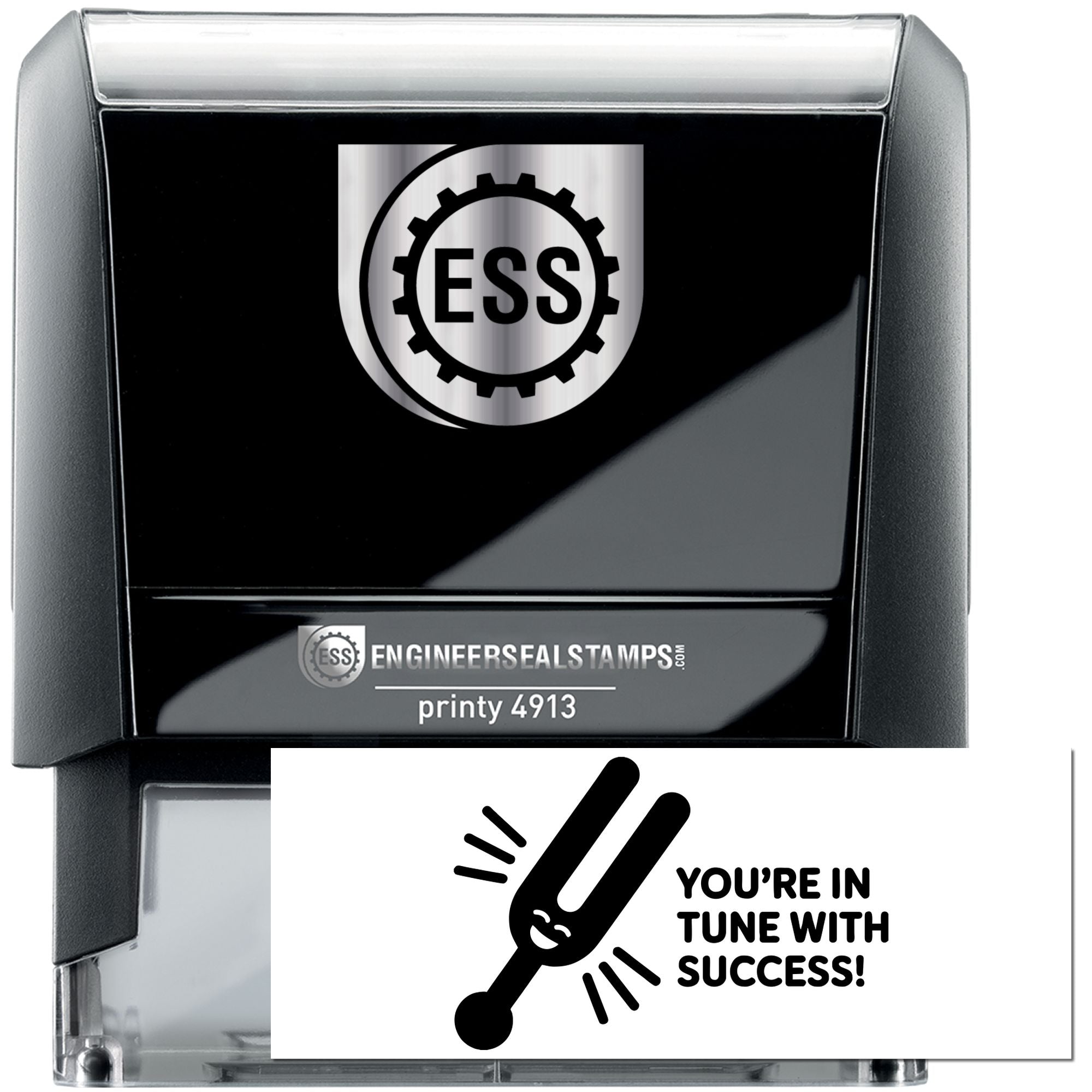 Black self-inking engineer seal stamp with silver top, ESS logo, and white slogan insert reading Youre in tune with success!