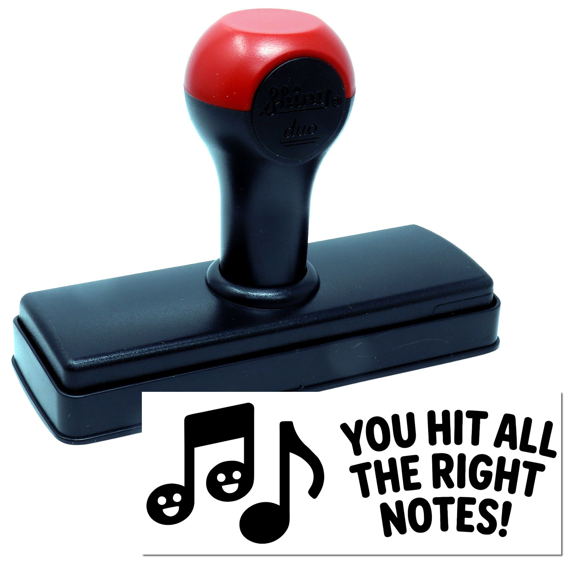 Red-and-black self-inking rubber stamp and seal with music notes and You hit all the right notes!