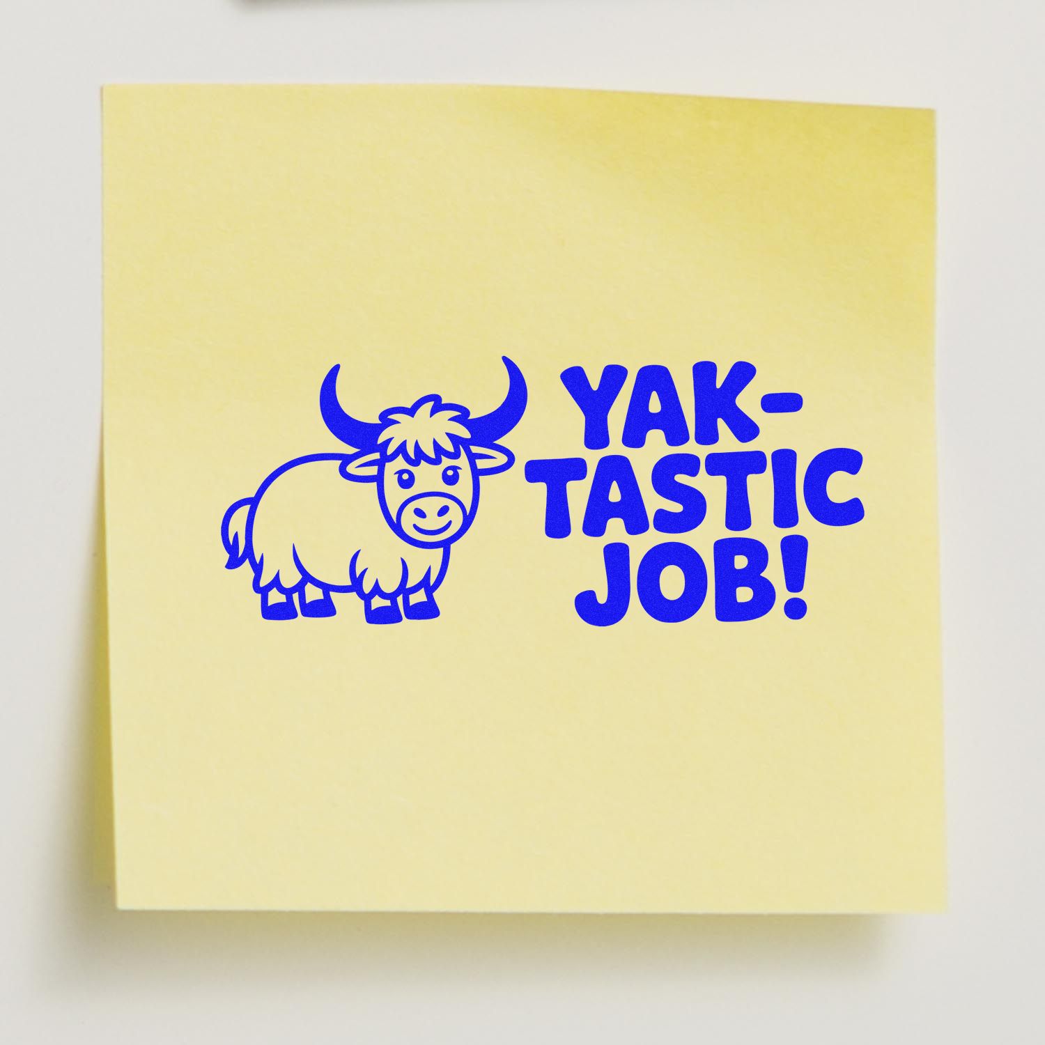 Blue YAK-TASTIC JOB! custom stamp and seal with cartoon yak on pale yellow background.