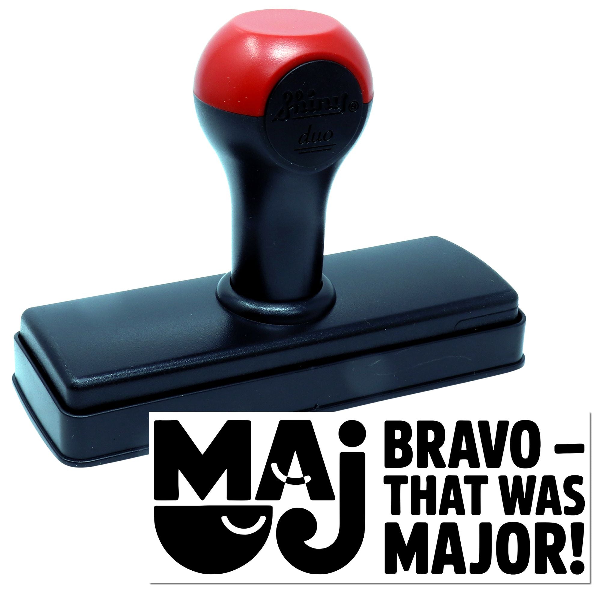 Red and black self-inking stamp and seal with handle, labeled MAJ and Bravo That Was Major! branding.