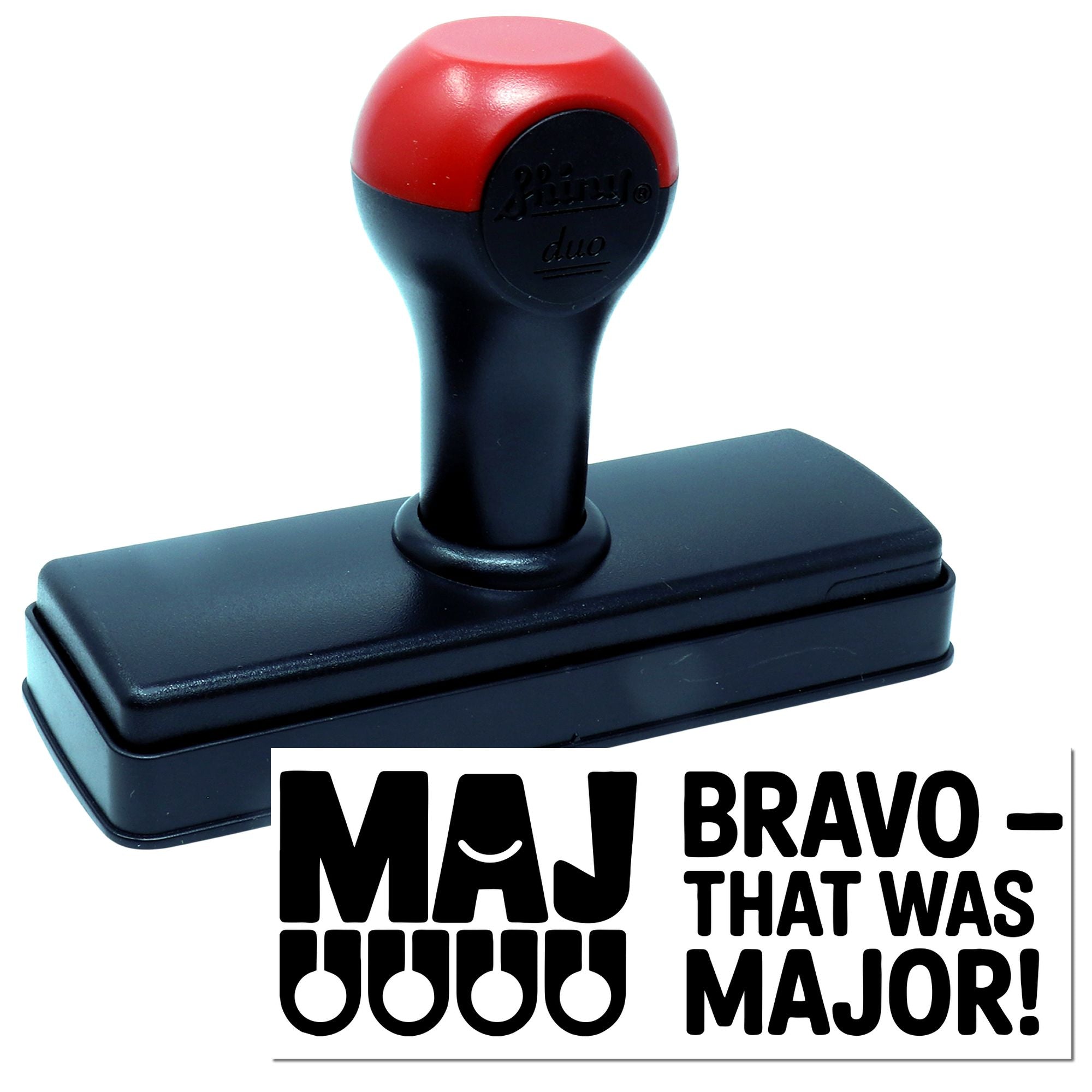Red and black self-inking stamp and seal with MAJ BRAVO THAT WAS MAJOR! text on white background