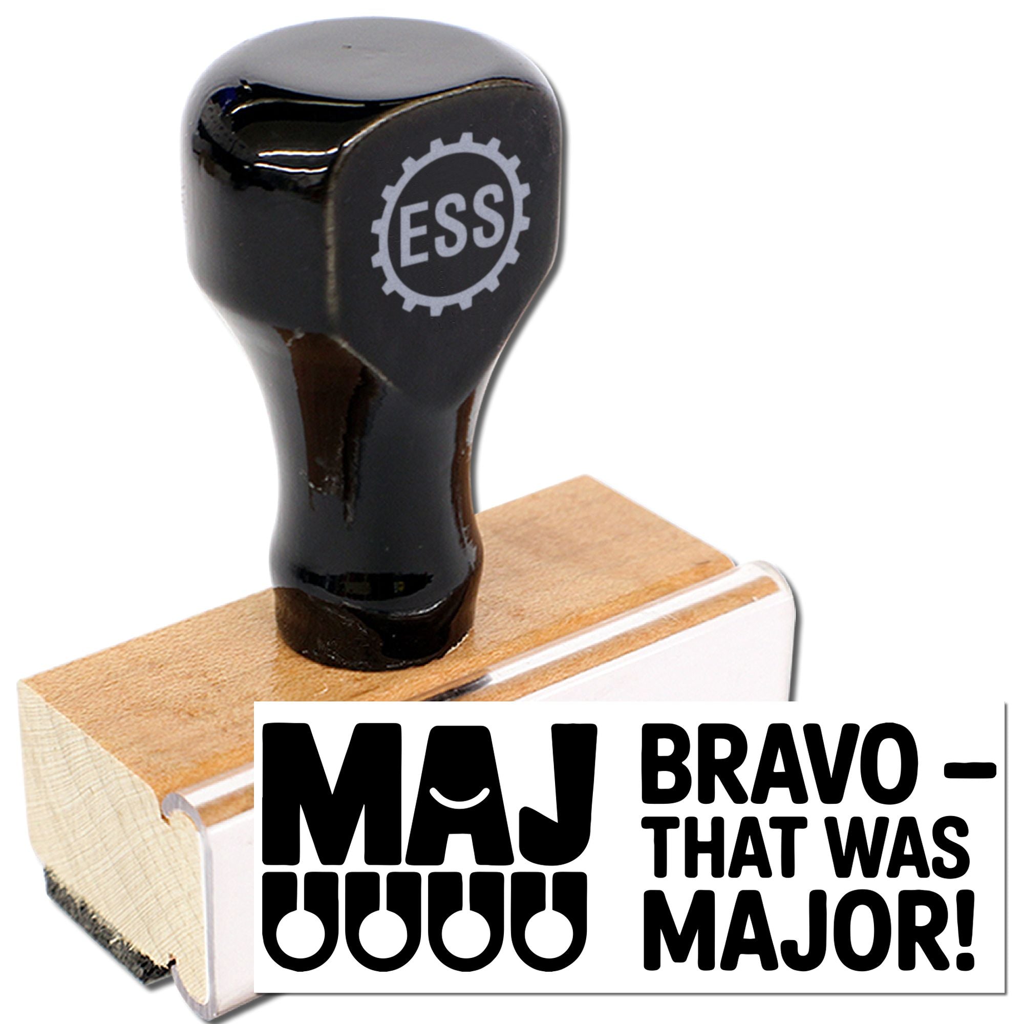 Black self-inking stamp seal with ESS logo on a wood base, printing bold MAJ BRAVO THAT WAS MAJOR! text.