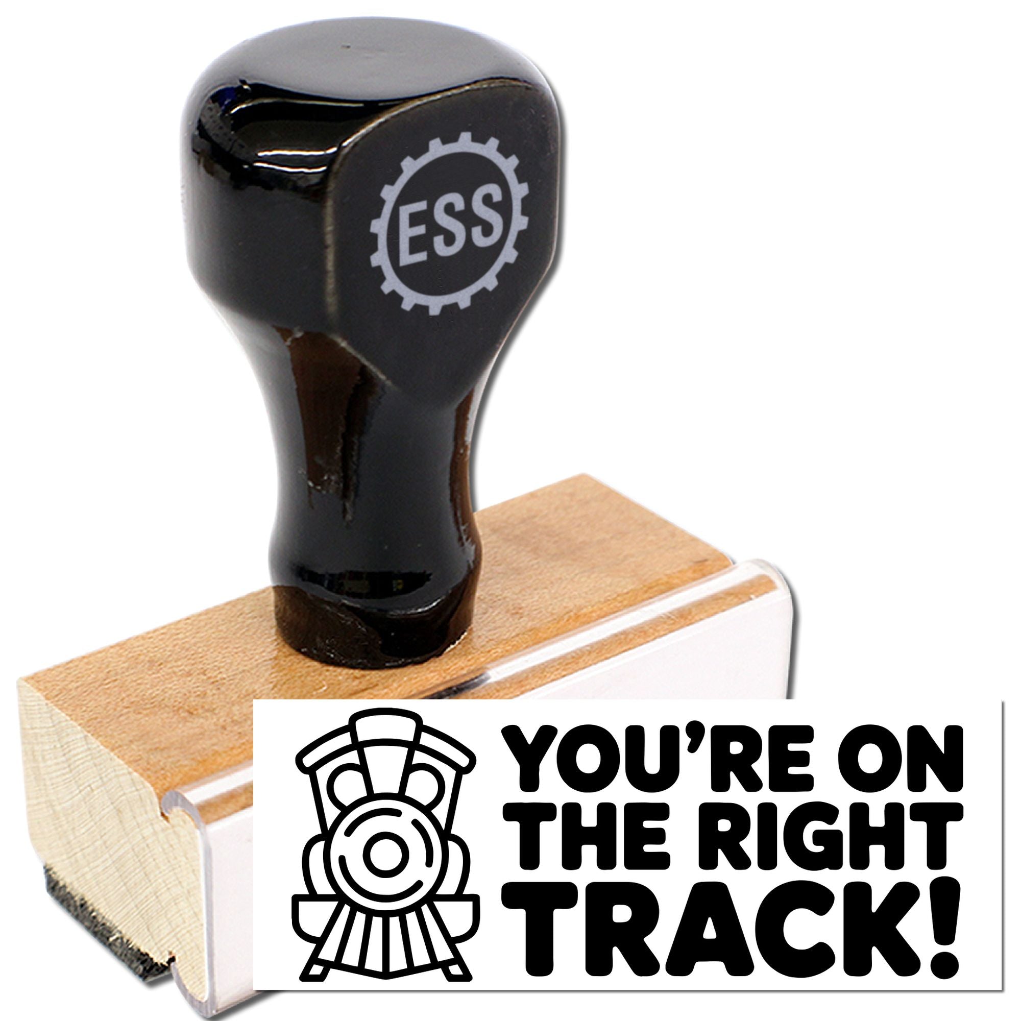 Black ESS rubber stamp with wooden base and white seal design reading Youre on the right track!