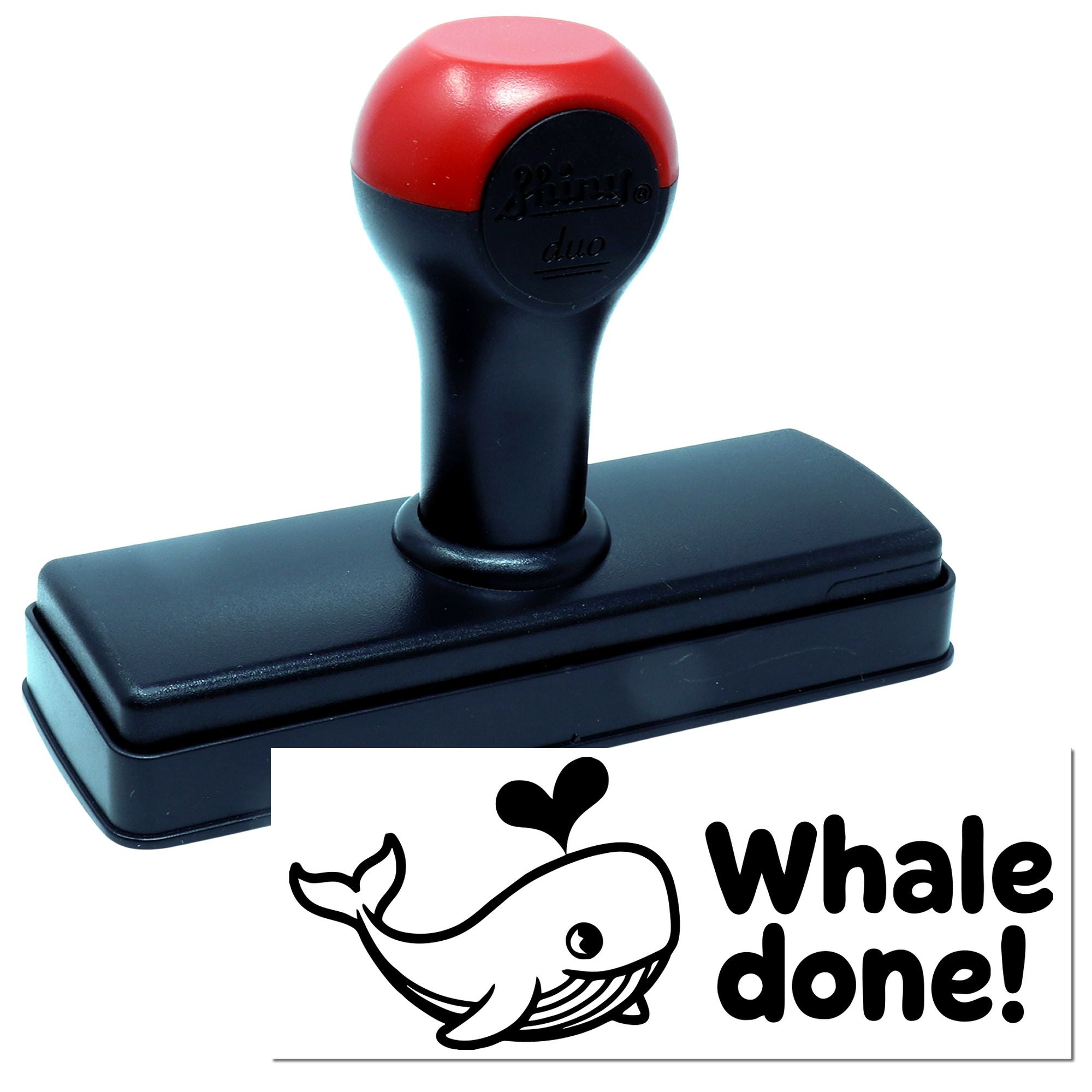 Red and black self-inking stamp and seal with a black base and whale logo imprint, featuring Whale done! branding.