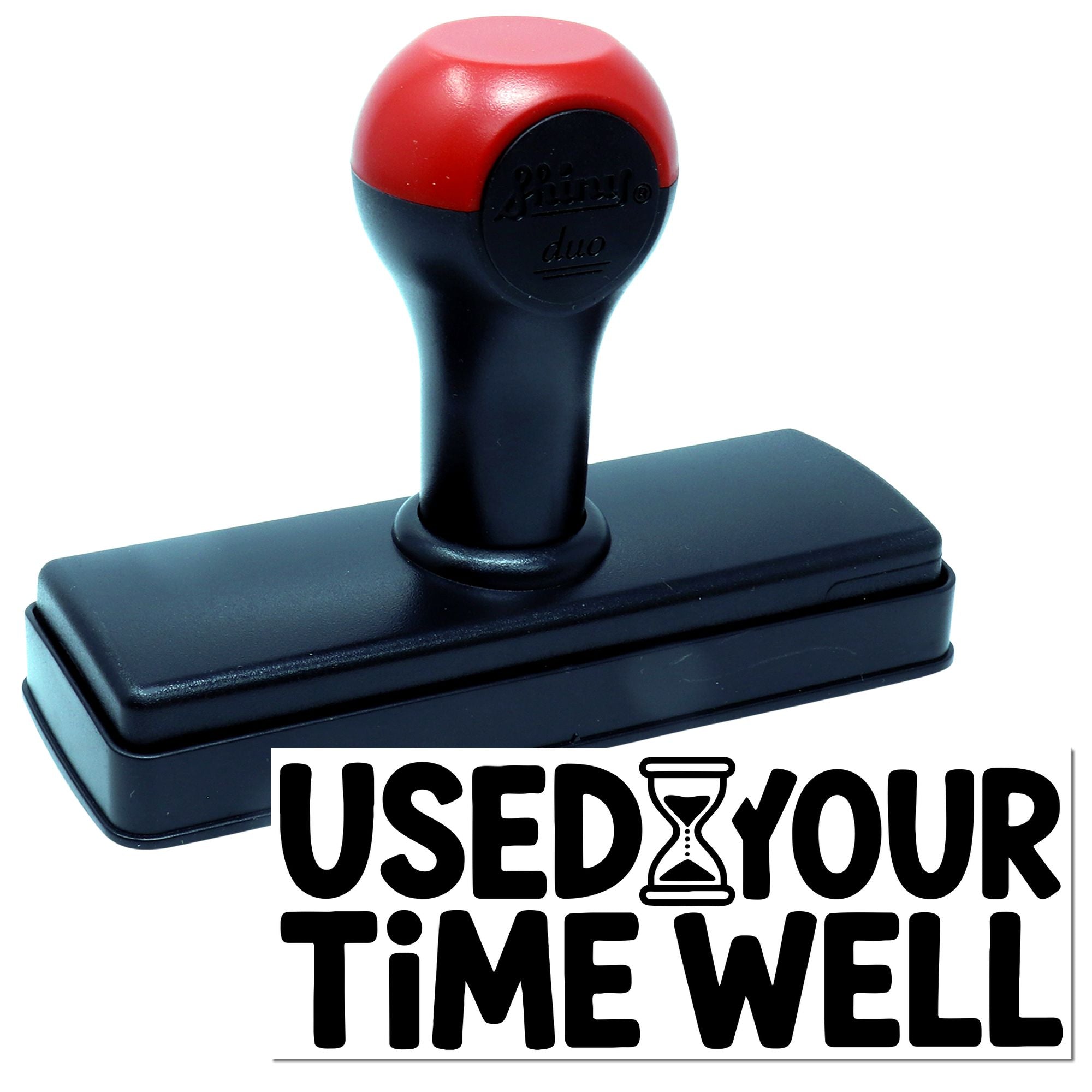 Red-and-black self-inking stamp and seal with rectangular base and USED YOUR TIME WELL text.
