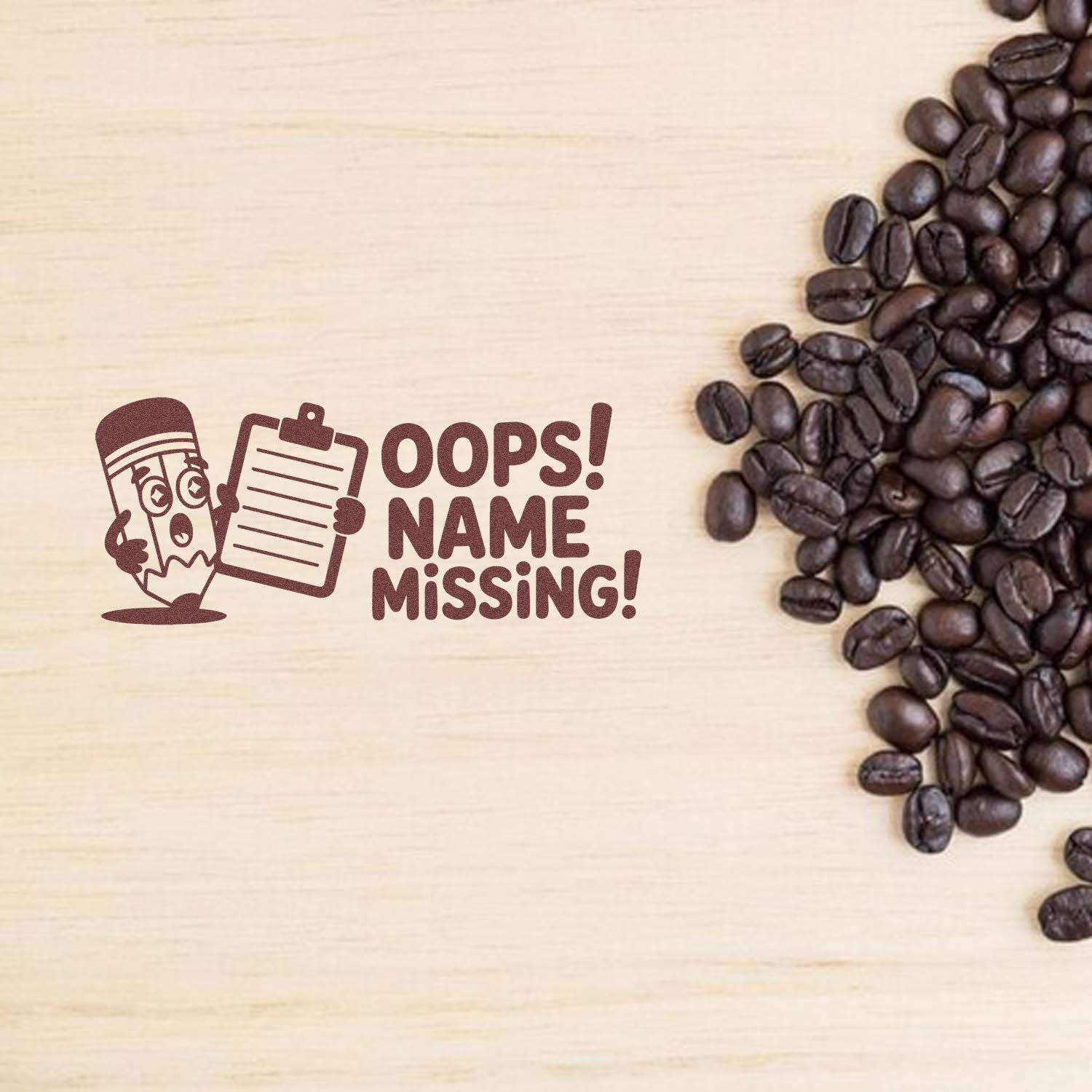 Brown custom stamp and seal graphic reading OOPS! NAME MISSING! beside coffee beans on a light wood background.