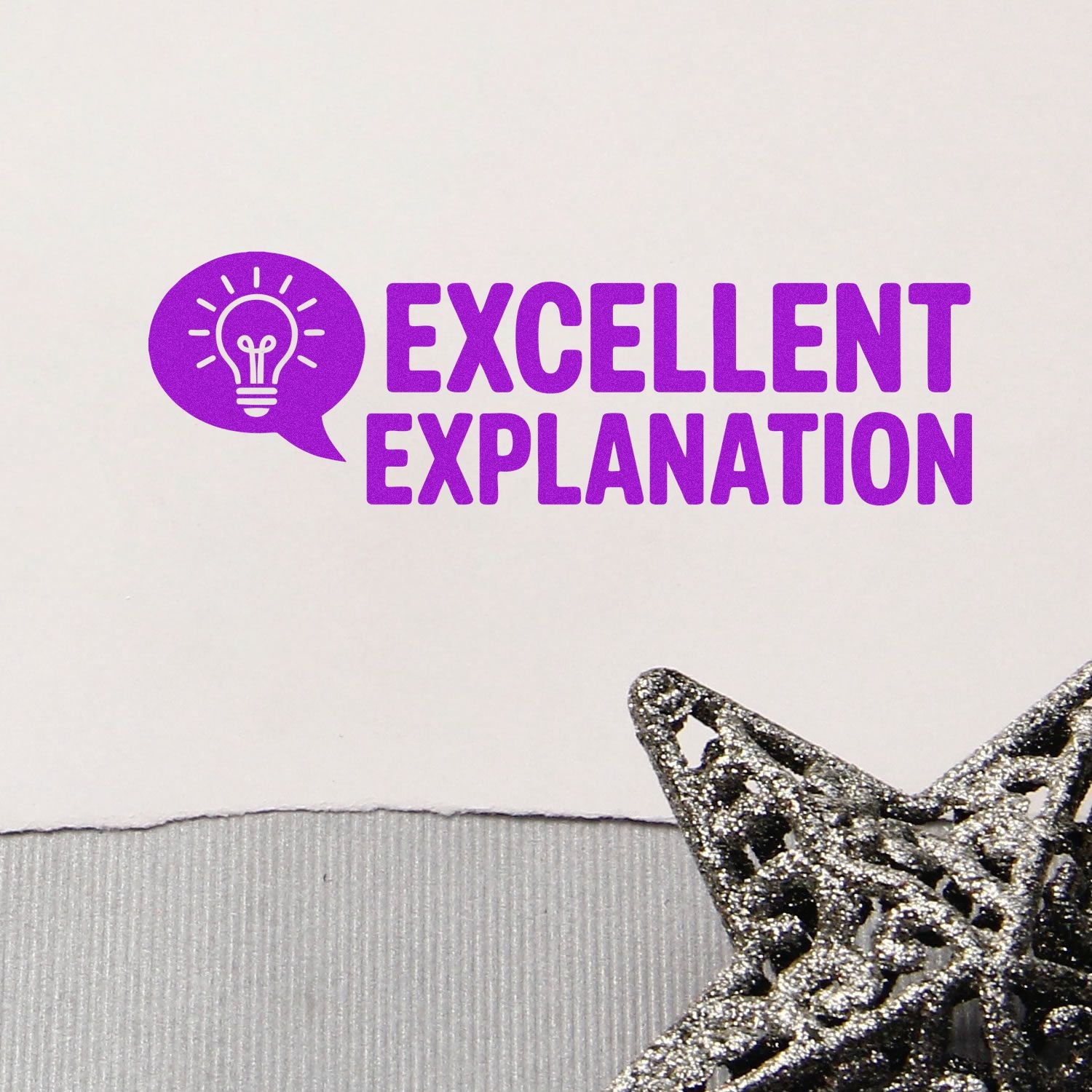 Purple Excellent Explanation stamp with lightbulb icon and glittery silver star seal on white background.