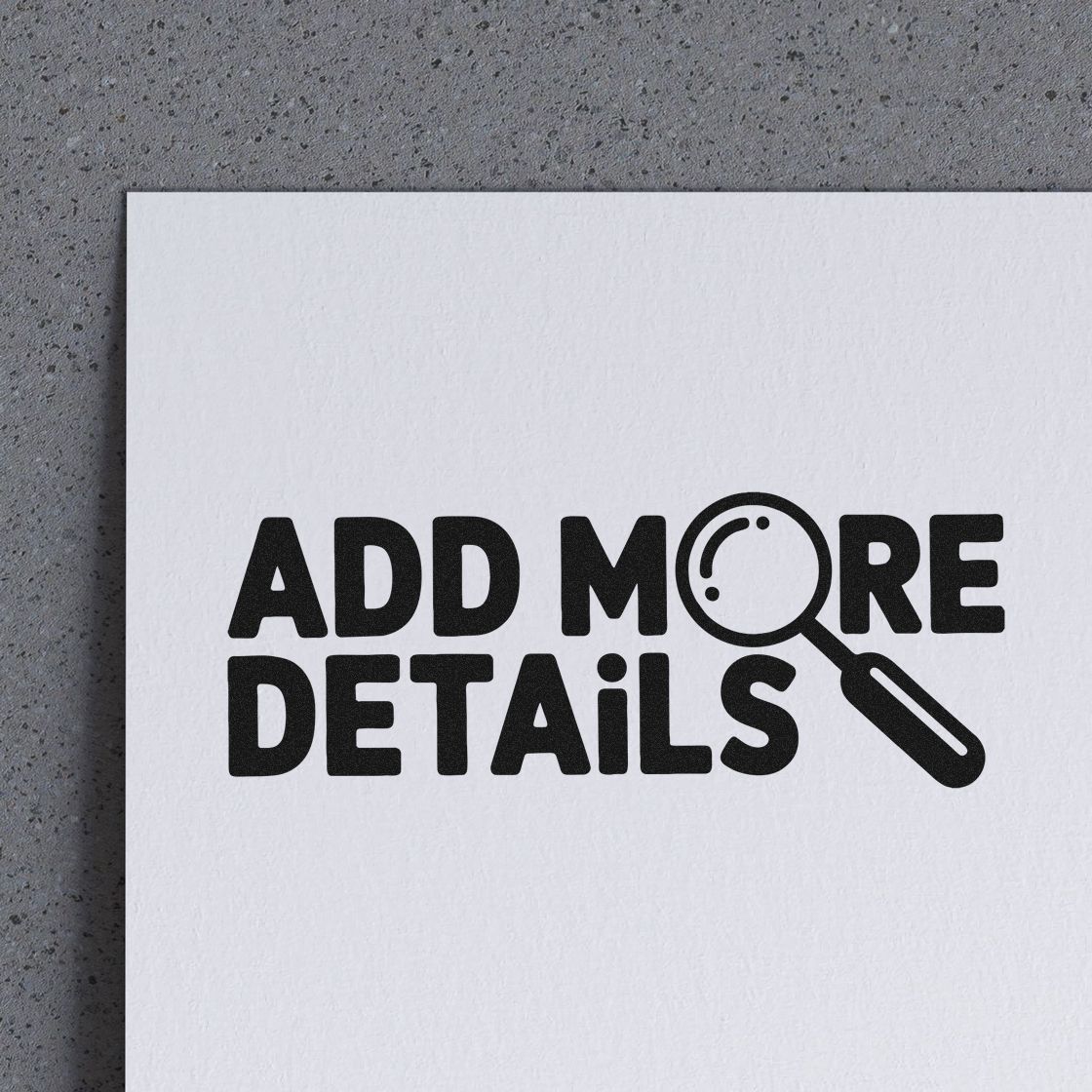 Black stamp seal reading Add More Details with magnifying glass icon on white paper.